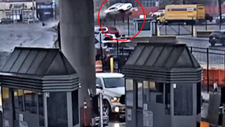 Surveillance footage captures moment car speeds into Rainbow Bridge