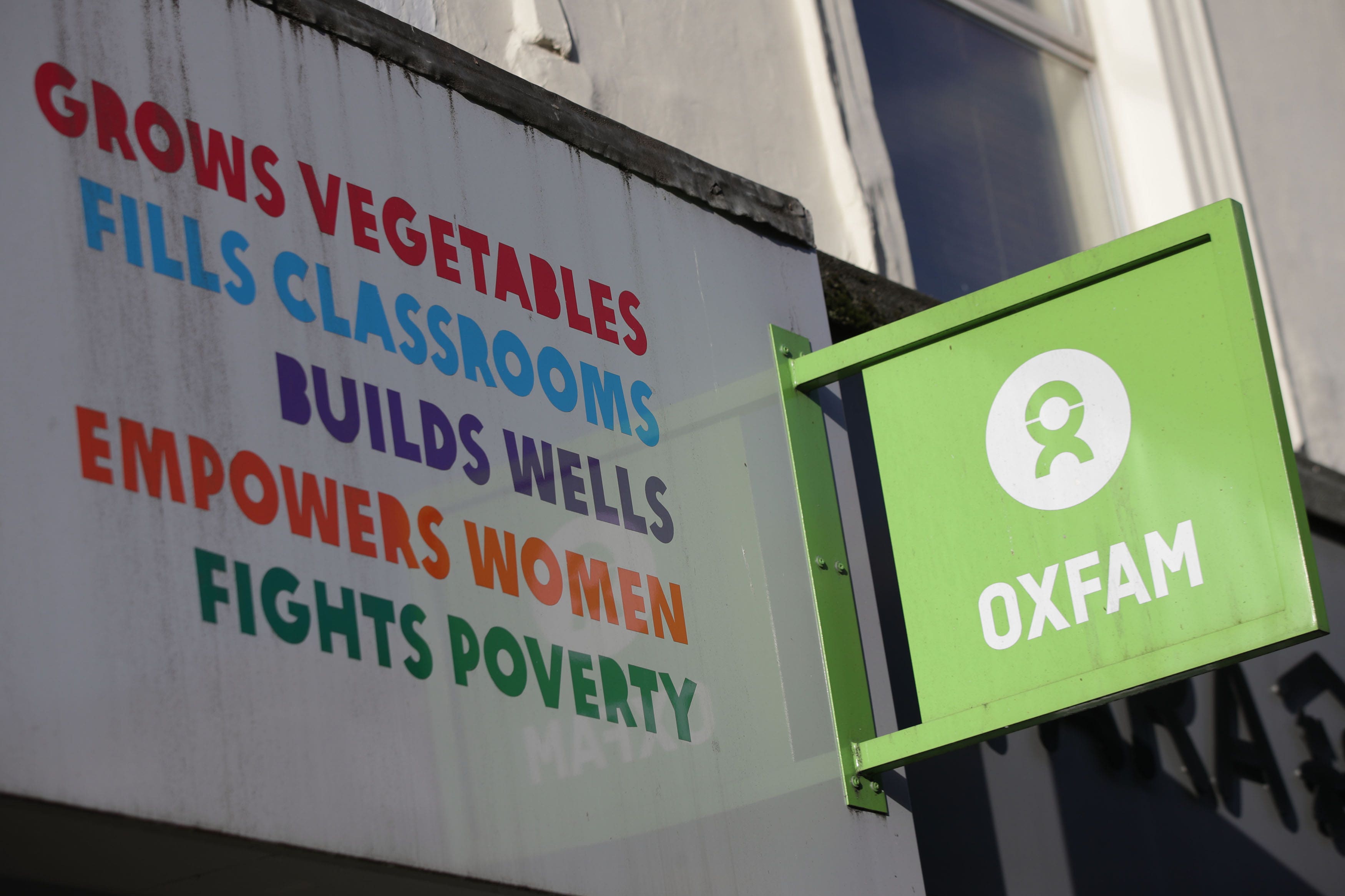 An Oxfam shop sign in London (Yui Mok/PA)