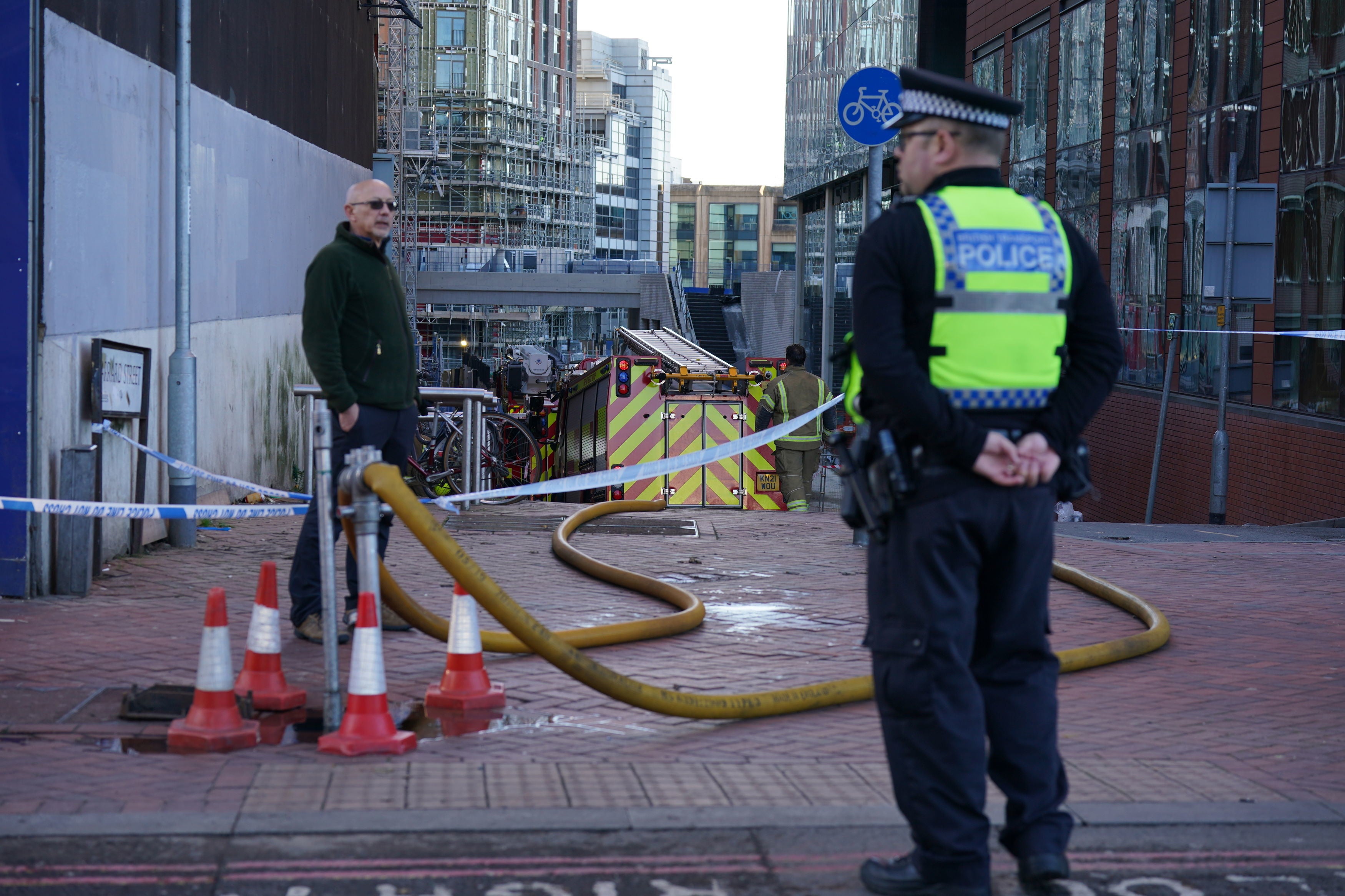 Authorities at the scene of the fire on Thursday