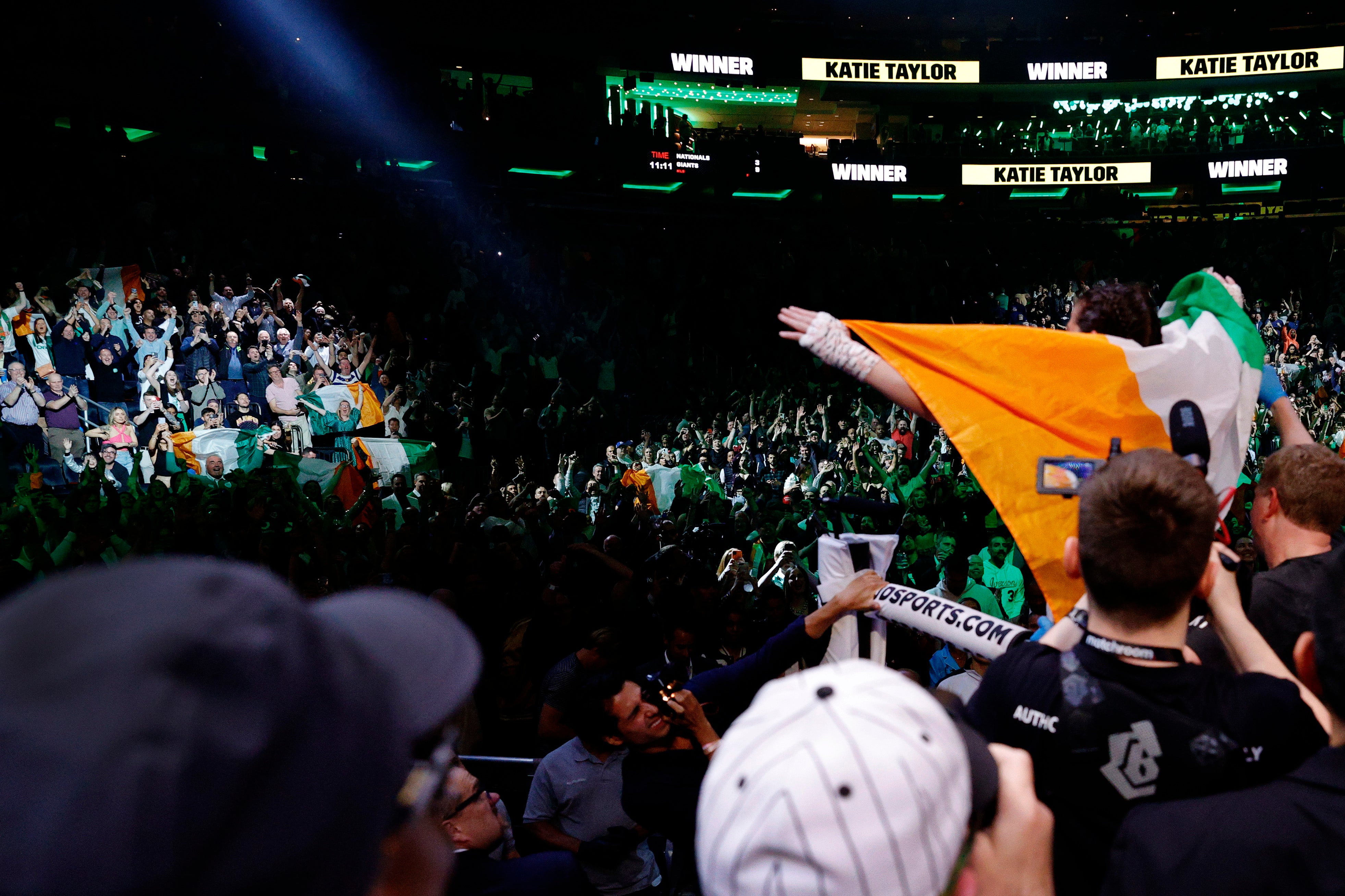 Taylor salutes her compatriots in Madison Square Garden, after edging past Amanda Serrano in the biggest women’s fight in boxing history