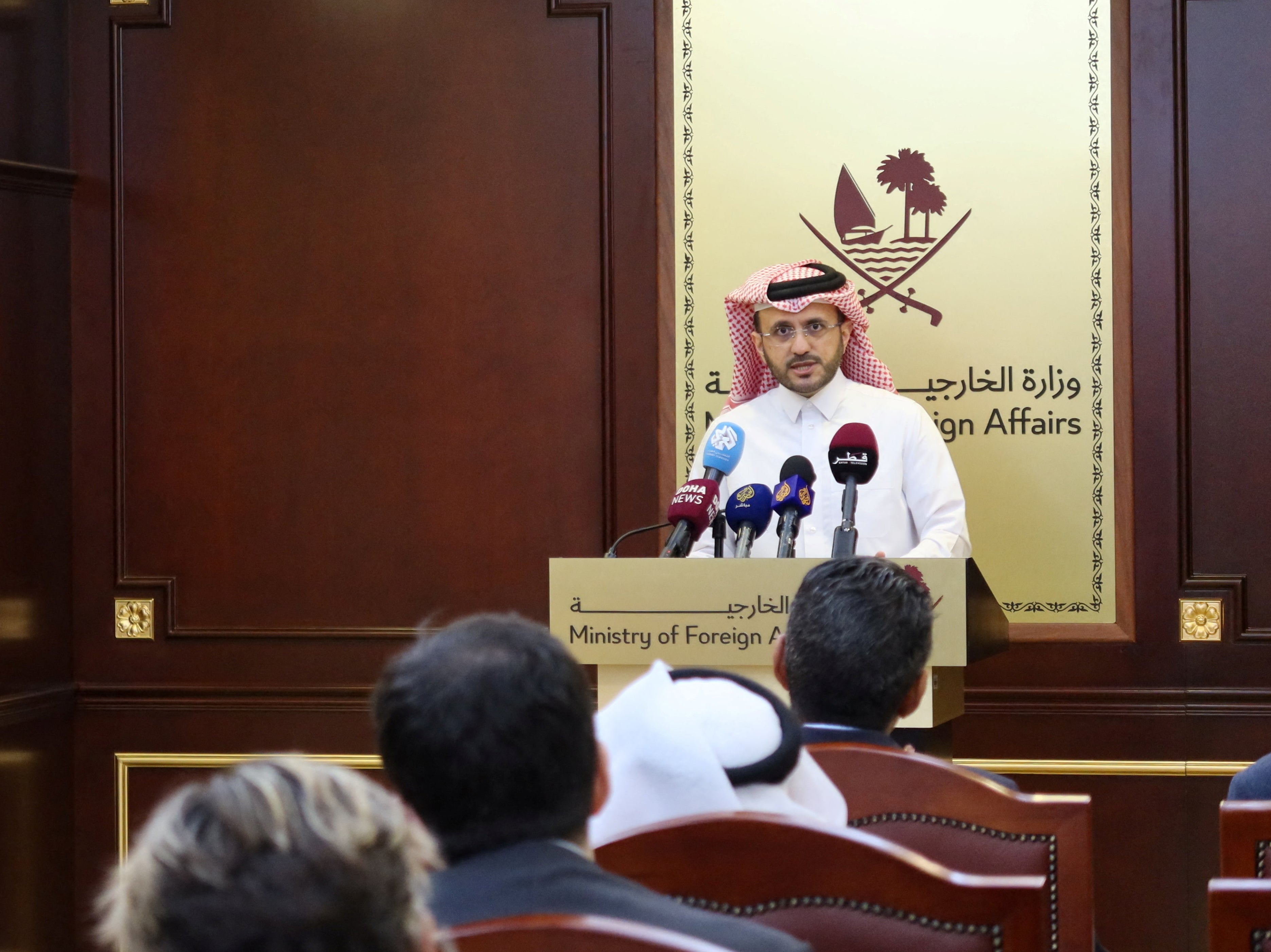 Qatar foreign ministry spokesman Majed al-Ansari briefs journalists in Doha about the ceasefire deal