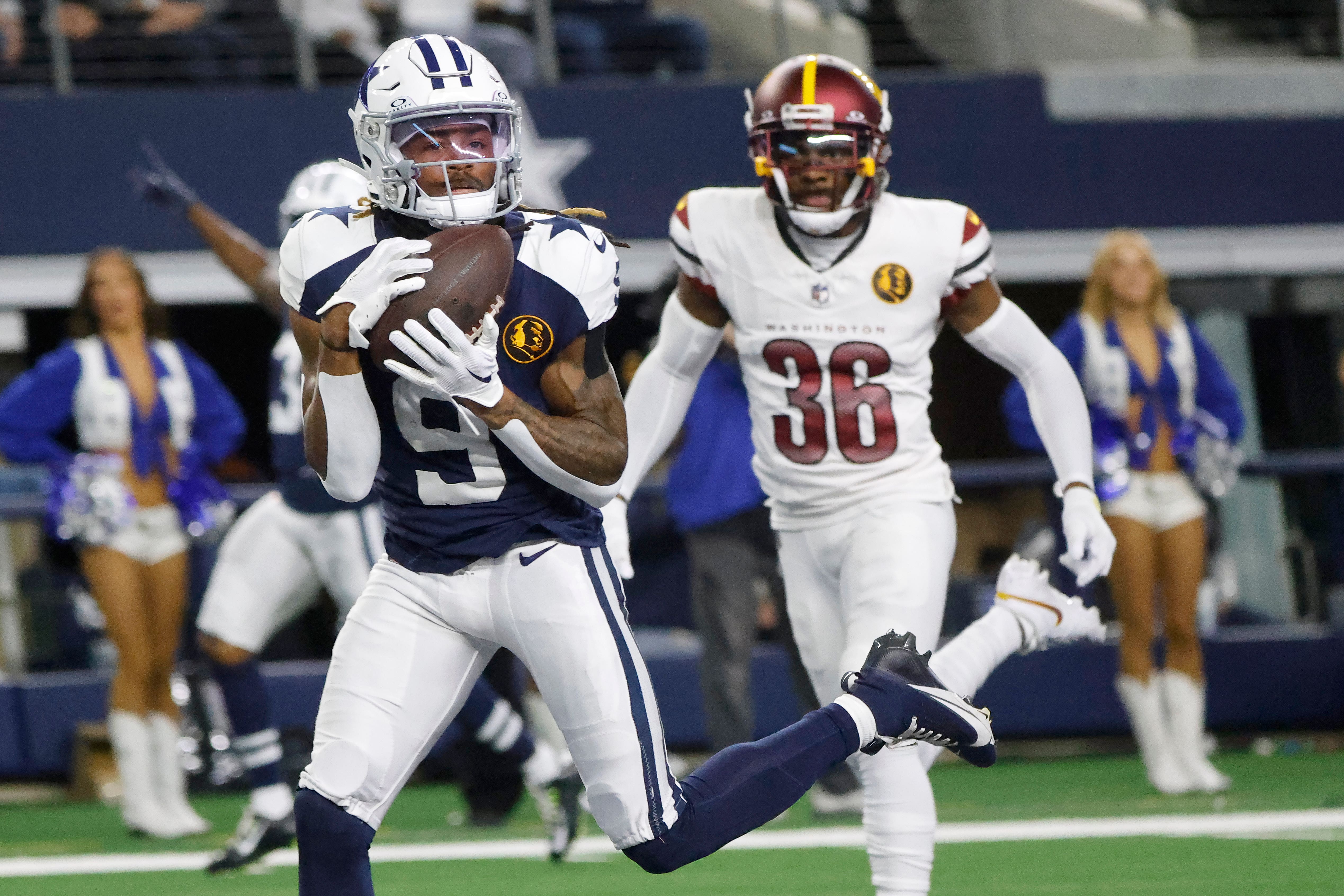 Dallas Cowboys wide receiver KaVontae Turpin catches a touchdown pass in front of Washington Commanders cornerback Danny Johnson (Michael Ainsworth/AP)