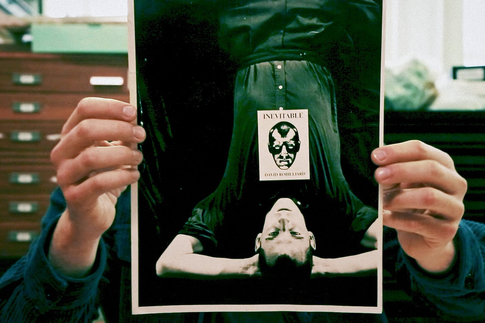 Russell Tovey holds a photo of David Robilliard