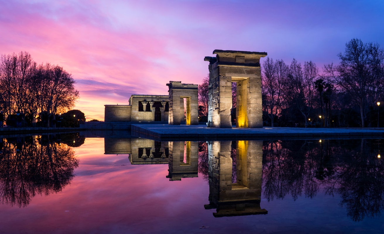 The temple is surrounded by placid pools and gardens