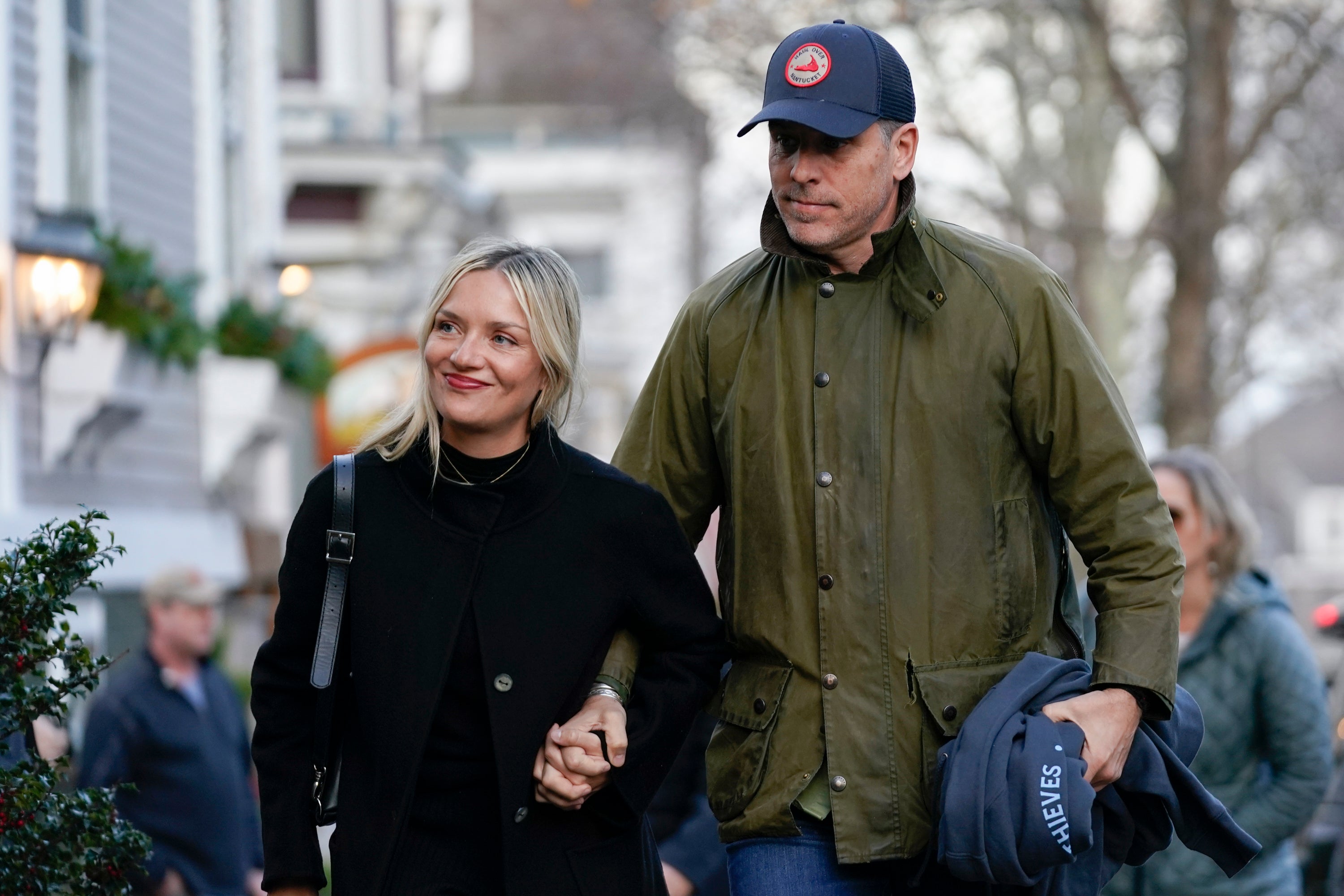 Hunter Biden walks with wife Melissa Cohen as they visit shops with President Joe Biden and first lady Jill Biden in Nantucket, Mass., 24 November 2023