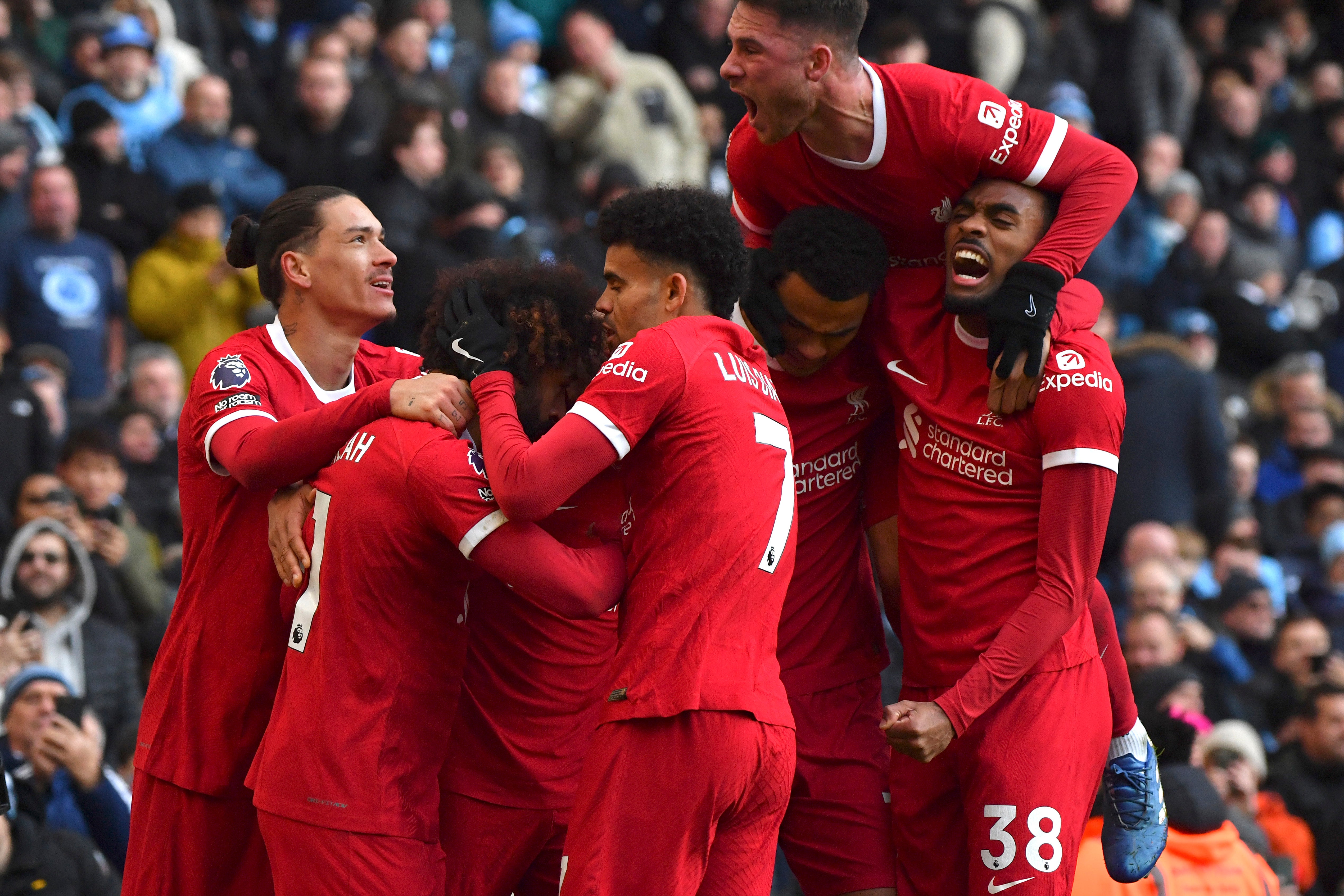 Trent Alexander-Arnold’s equaliser keeps Liverpool just a point behind Manchester City