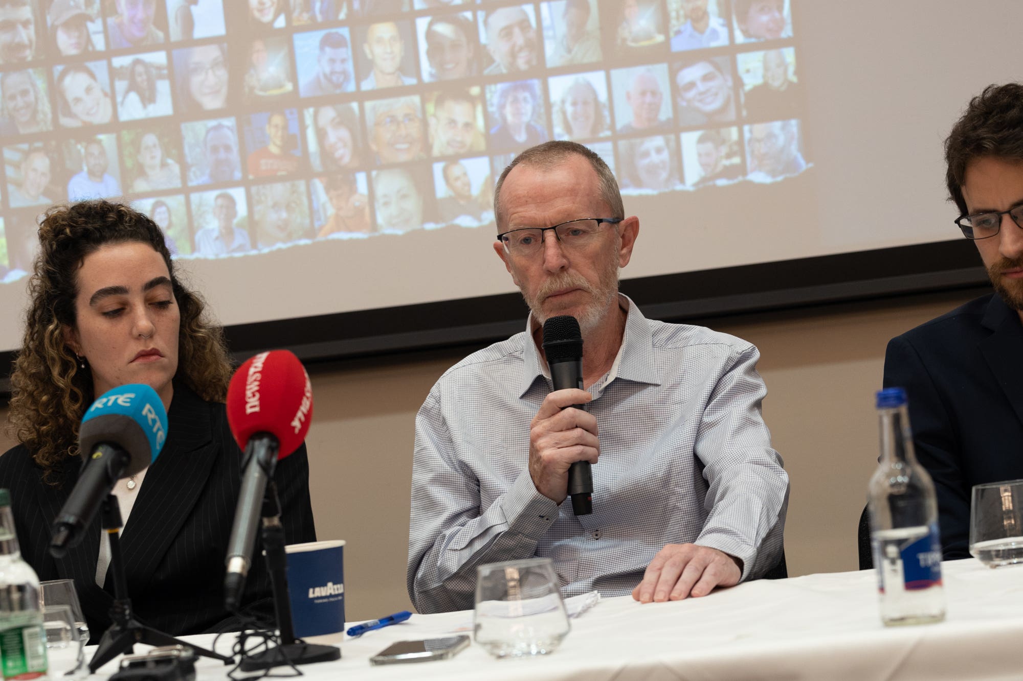 Thomas Hand, centre, speaks at a press conference for families of hostages taken from Israel (Norma Burke/PA)