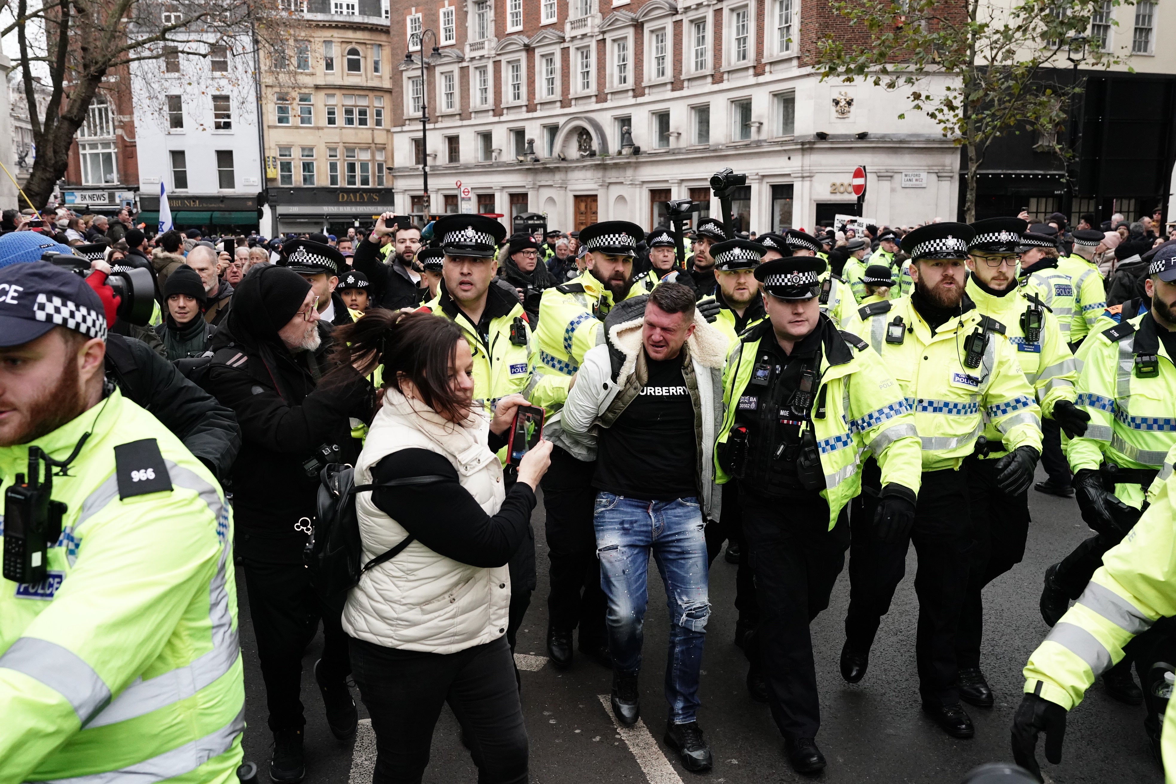 Robinson was led away by a number of officers