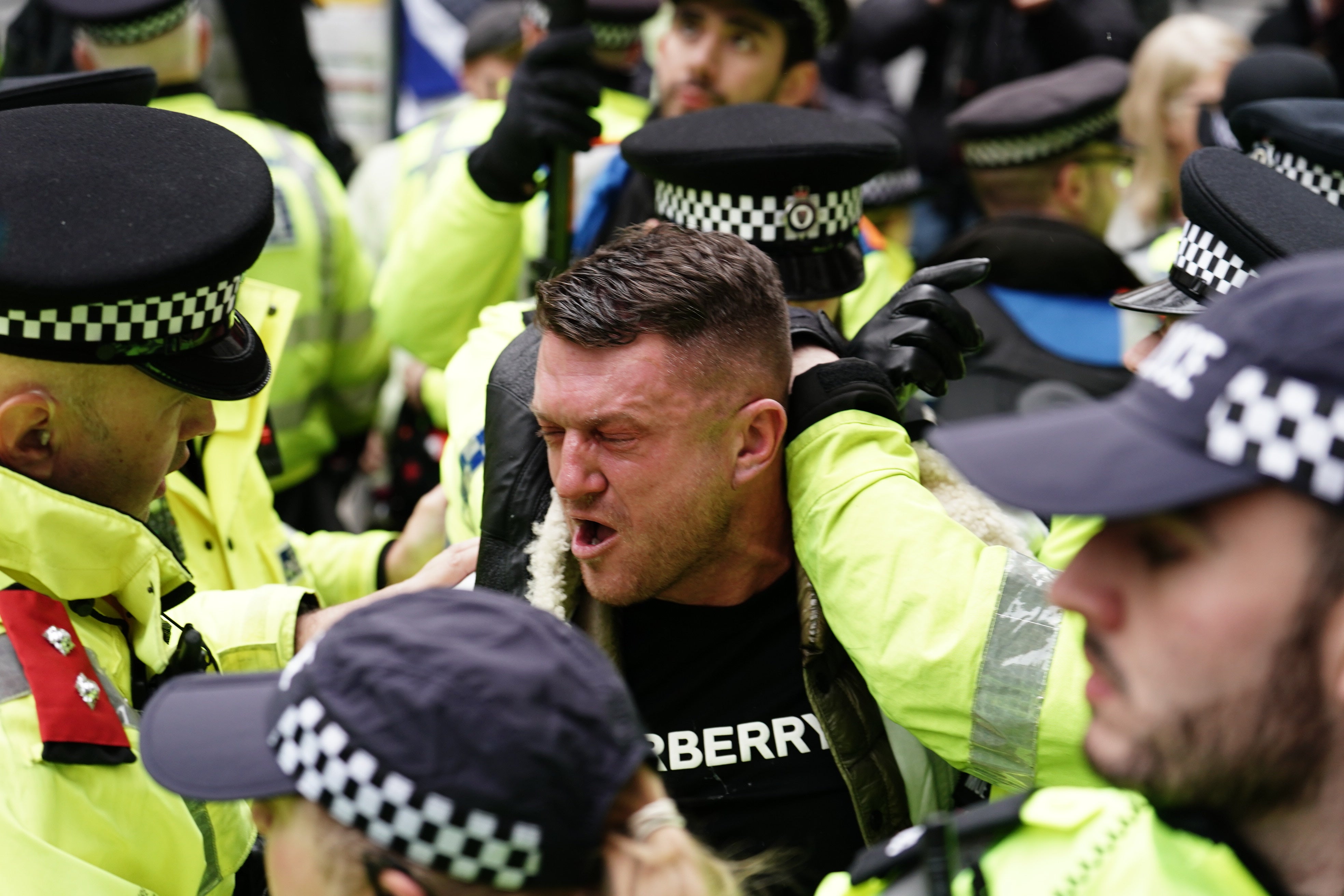 Tommy Robinson was arrested at the march against antisemitism