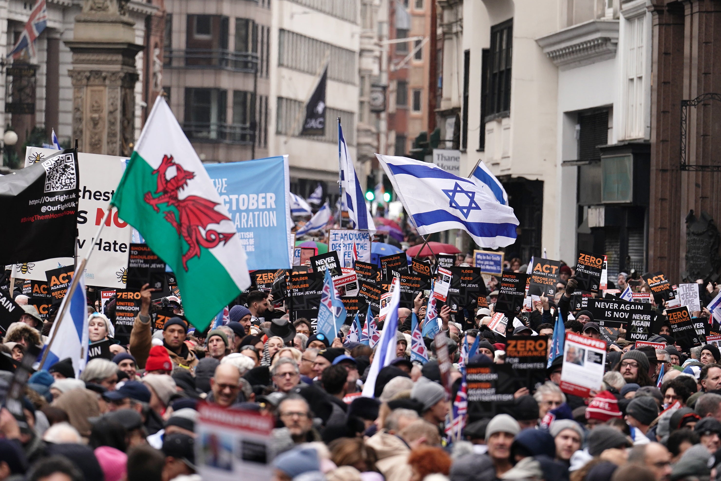 People take part in a march against antisemitism organised by the volunteer-led charity Campaign Against Antisemitism at the Royal Courts of Justice in London