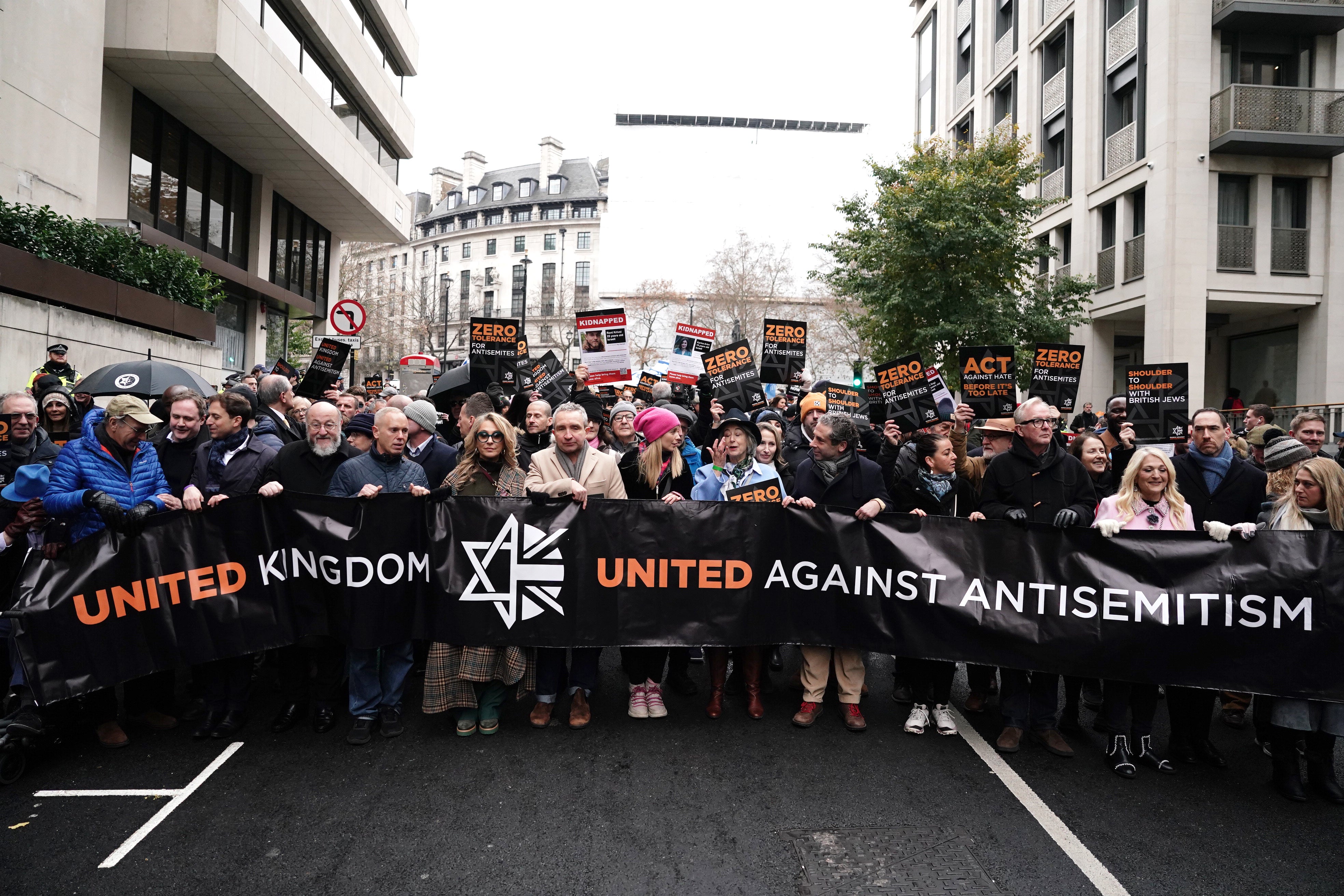 Picture shows (fifth from left) Chief Rabbi Mirvis (left to right) Robert Rinder, Tracey-Ann Oberman, Eddie Marsan, Rachel Riley, Maureen Lipman and (second from right) Vanessa Feltz take part in a march against antisemitism organised by the volunteer-led charity Campaign Against Antisemitism at the Royal Courts of Justice in London