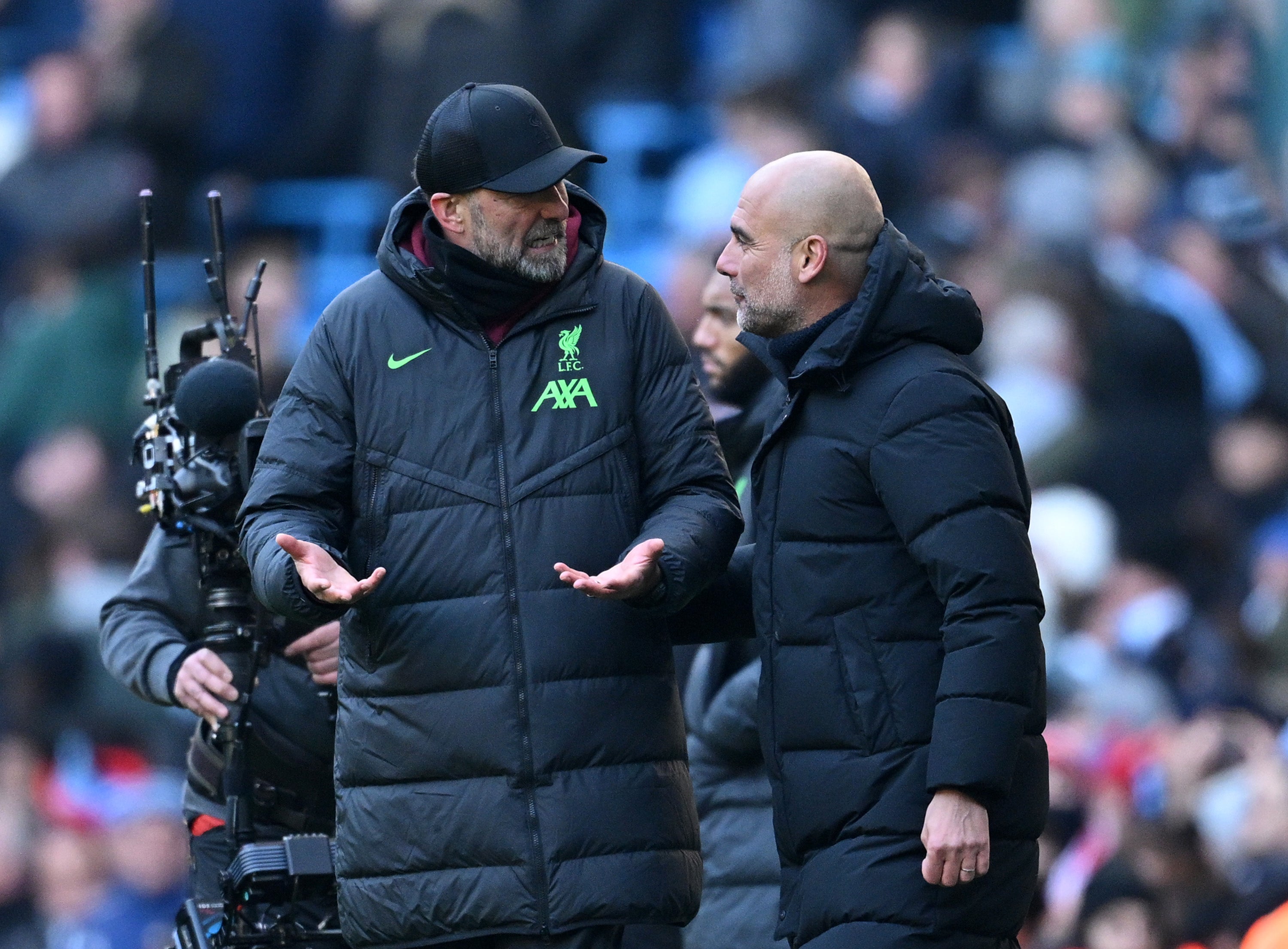 Klopp and Guardiola exchange thoughts on the touchline