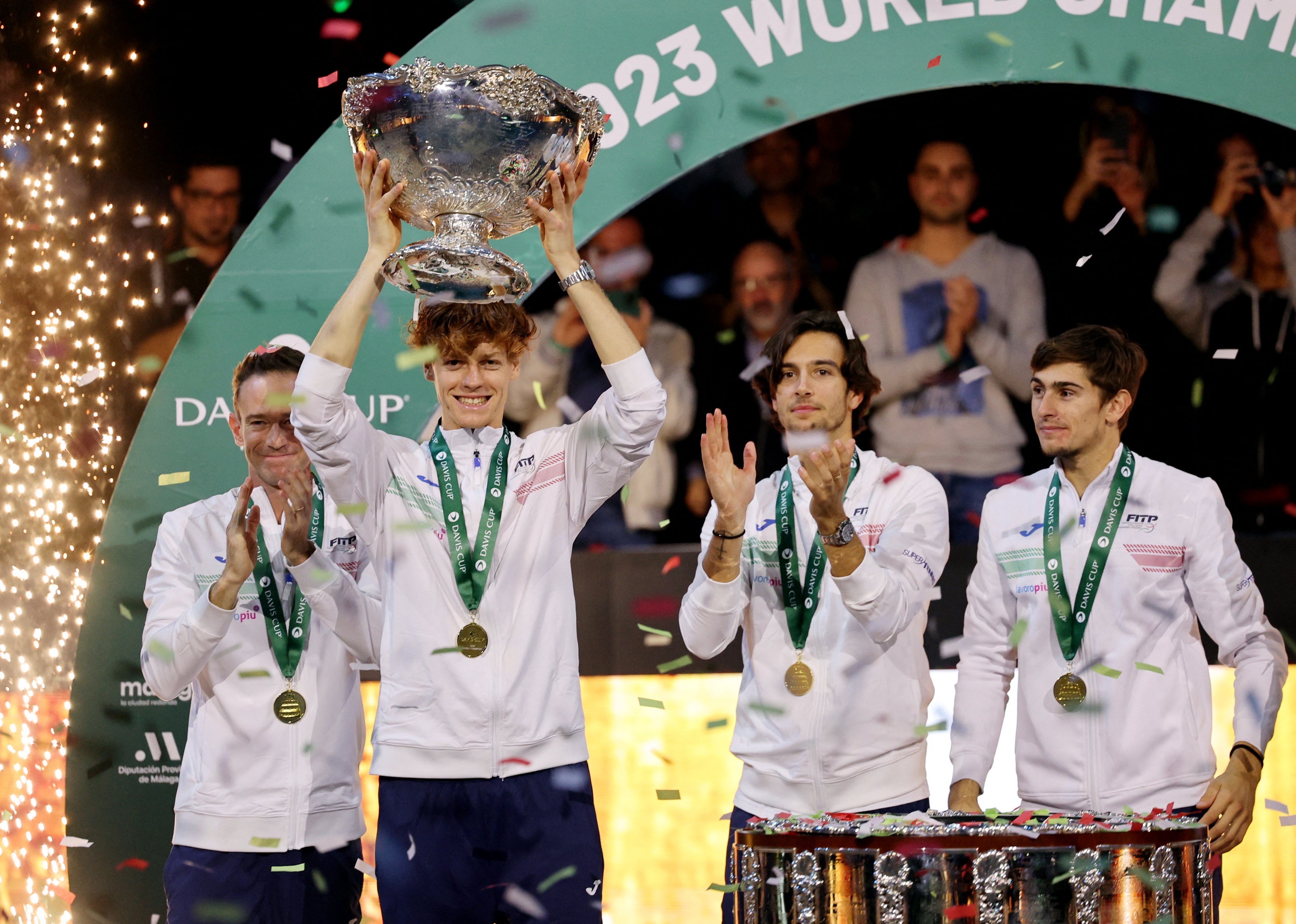 Italy hold aloft the Davis Cup trophy for the first time in 47 years