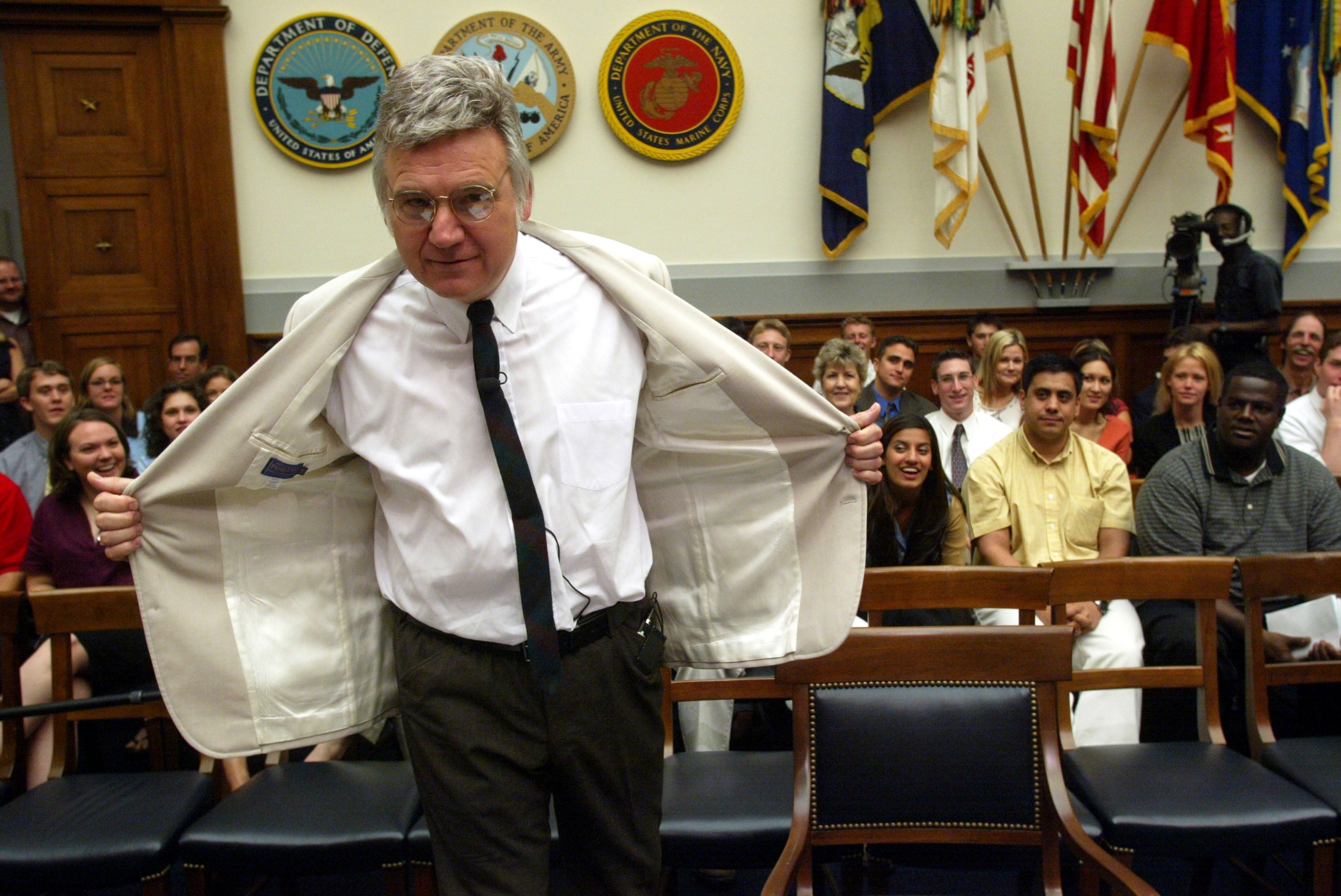 U.S. Rep. James Traficant (D-OH) poses for photographers before a House Inquiry Subcommittee hearing to examine whether he violated congressional rules July 17, 2002 on Capitol Hill in Washington, DC