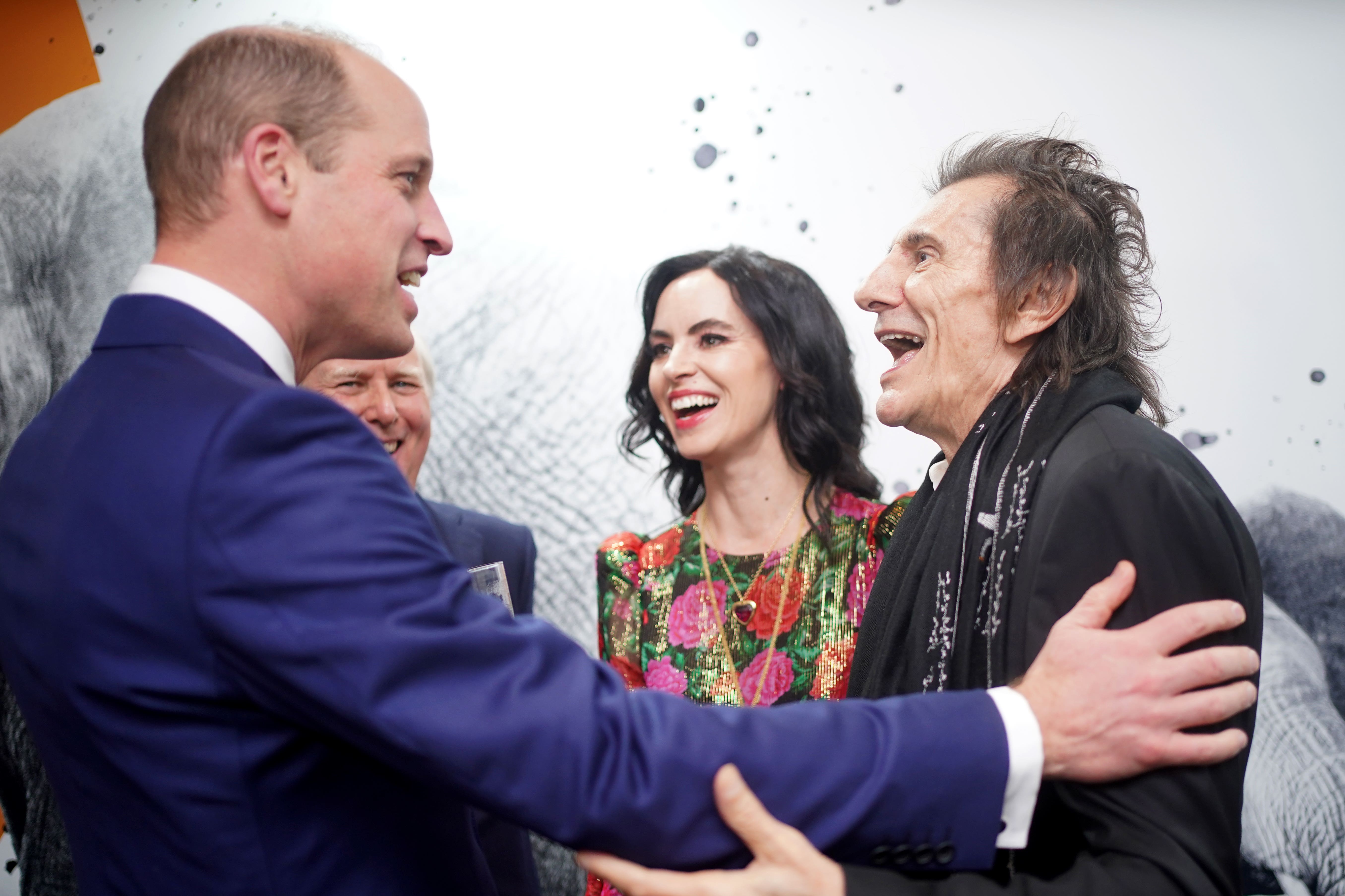 The Prince of Wales speaks with Sally Humphreys and Ronnie Wood at the 11th annual Tusk Conservation Awards (Victoria Jones/PA)