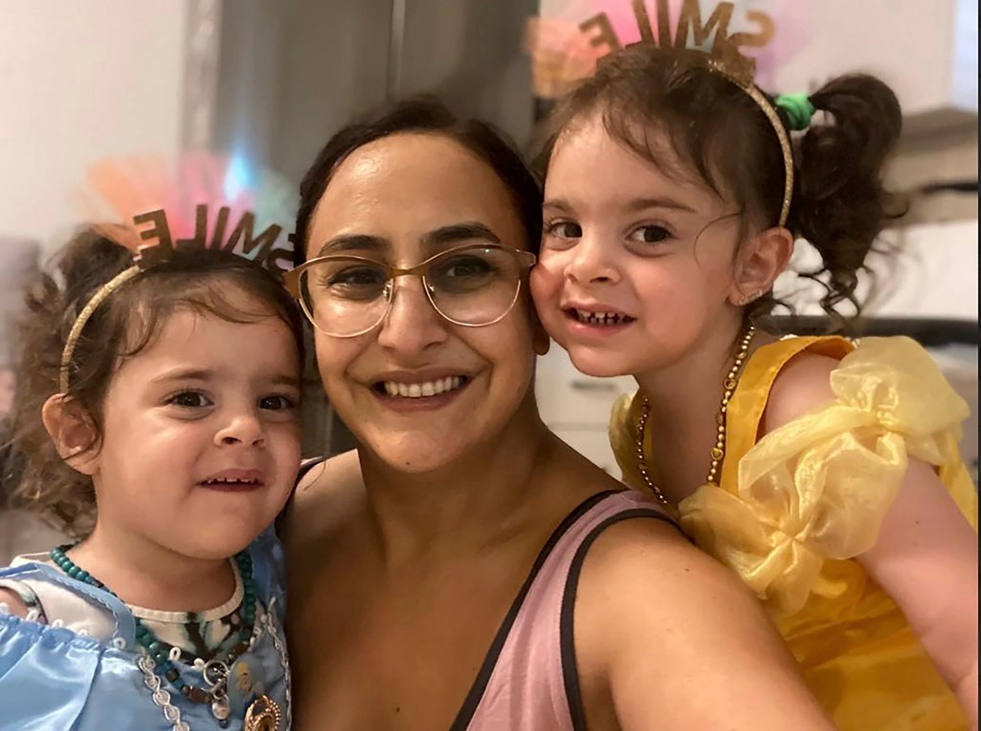 Sharon Aloni-Cunio with her daughters Yuli and Emma Cunio