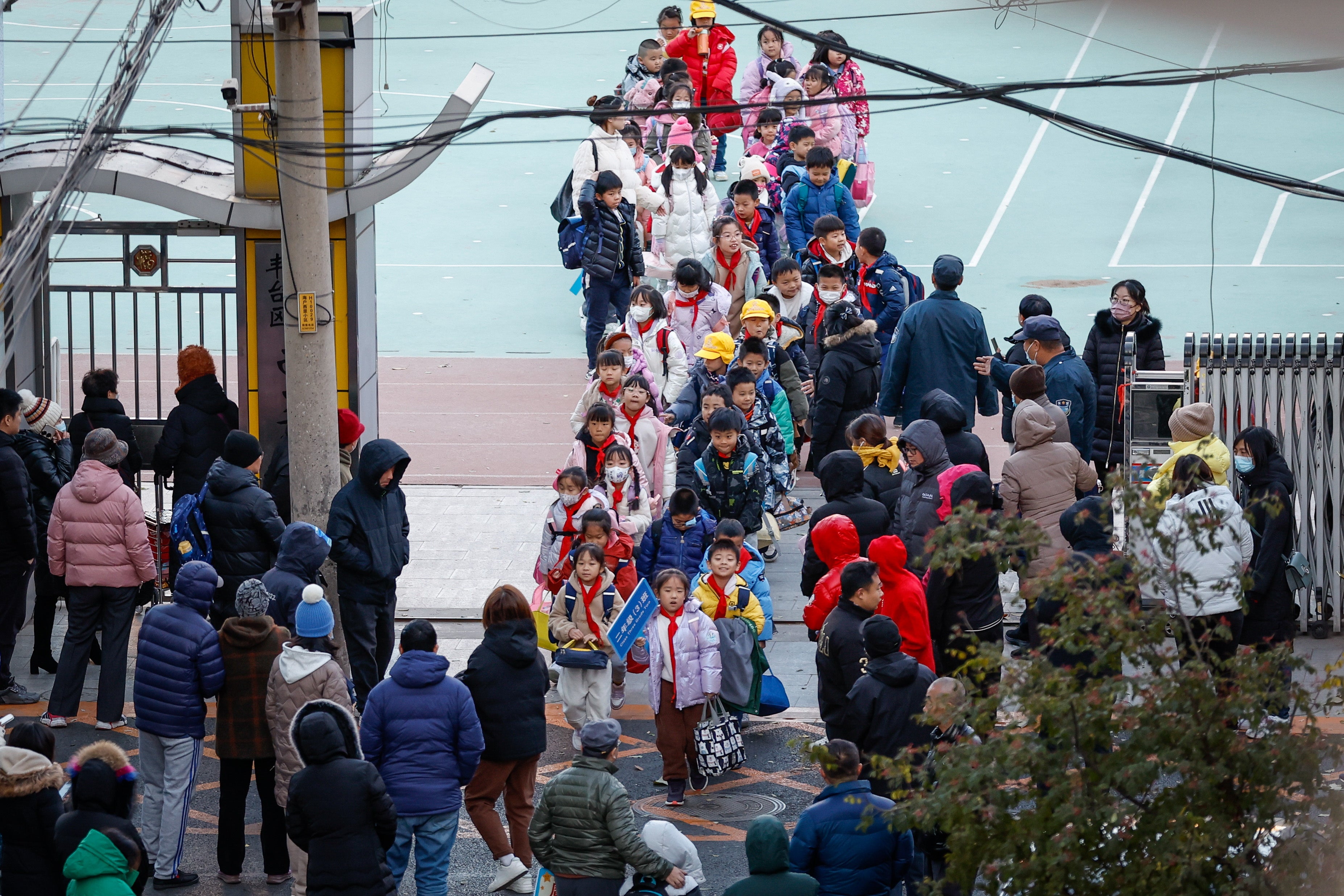 Students are dismissed from a school in Beijing