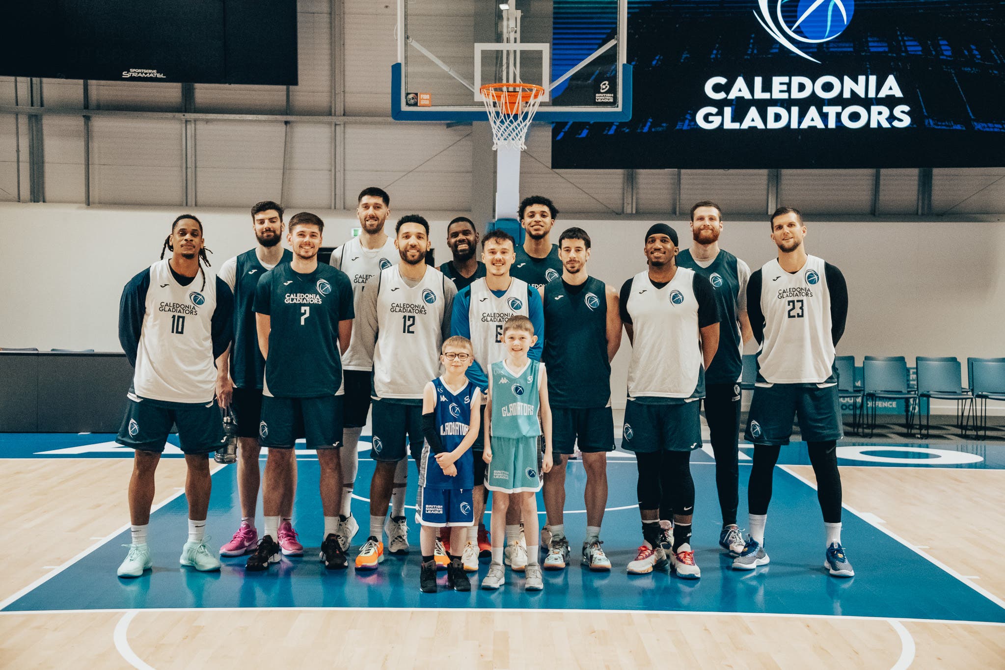 Max Philliban, aged 10, and friend Jake Richie with Caledonia Gladiators (Caledonia Gladiators/PA)