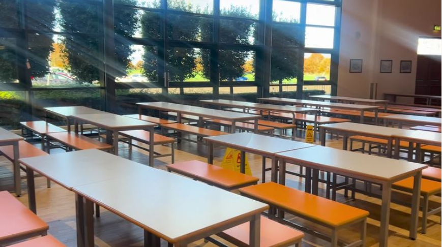 Families have their food provided at the former school canteen