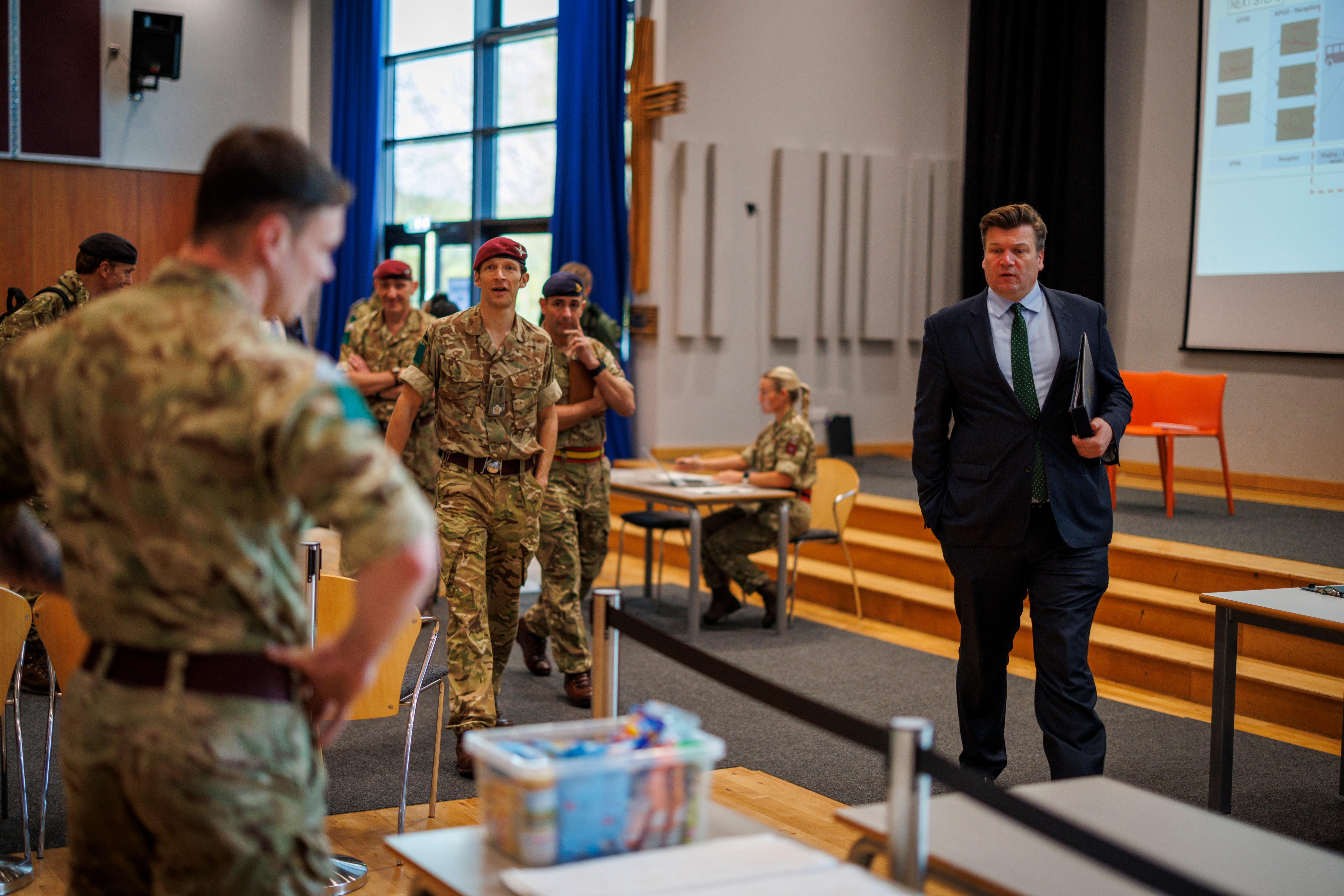 Defence minister James Heappey is shown the lecture hall that has been turned into a reception room