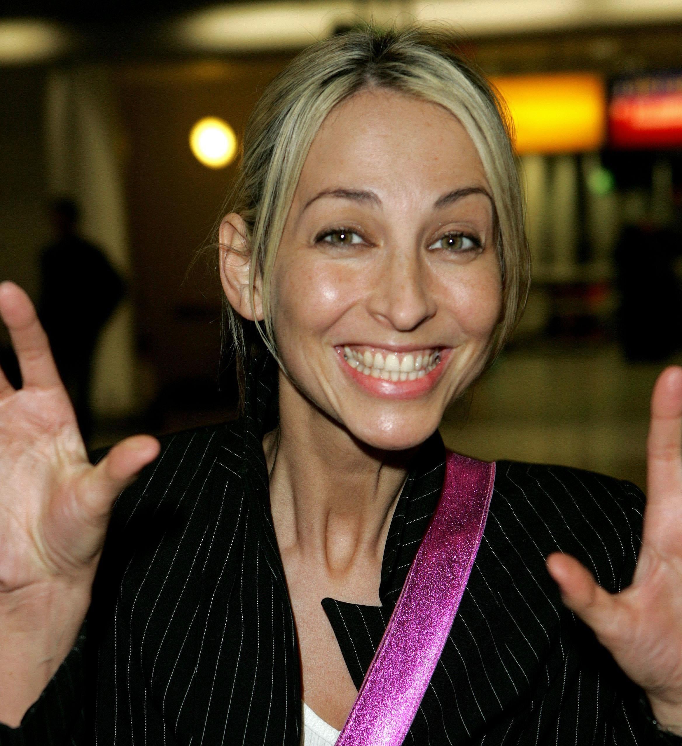 Natalie Appleton at London's Heathrow Airport before flying out to Australia in 2004