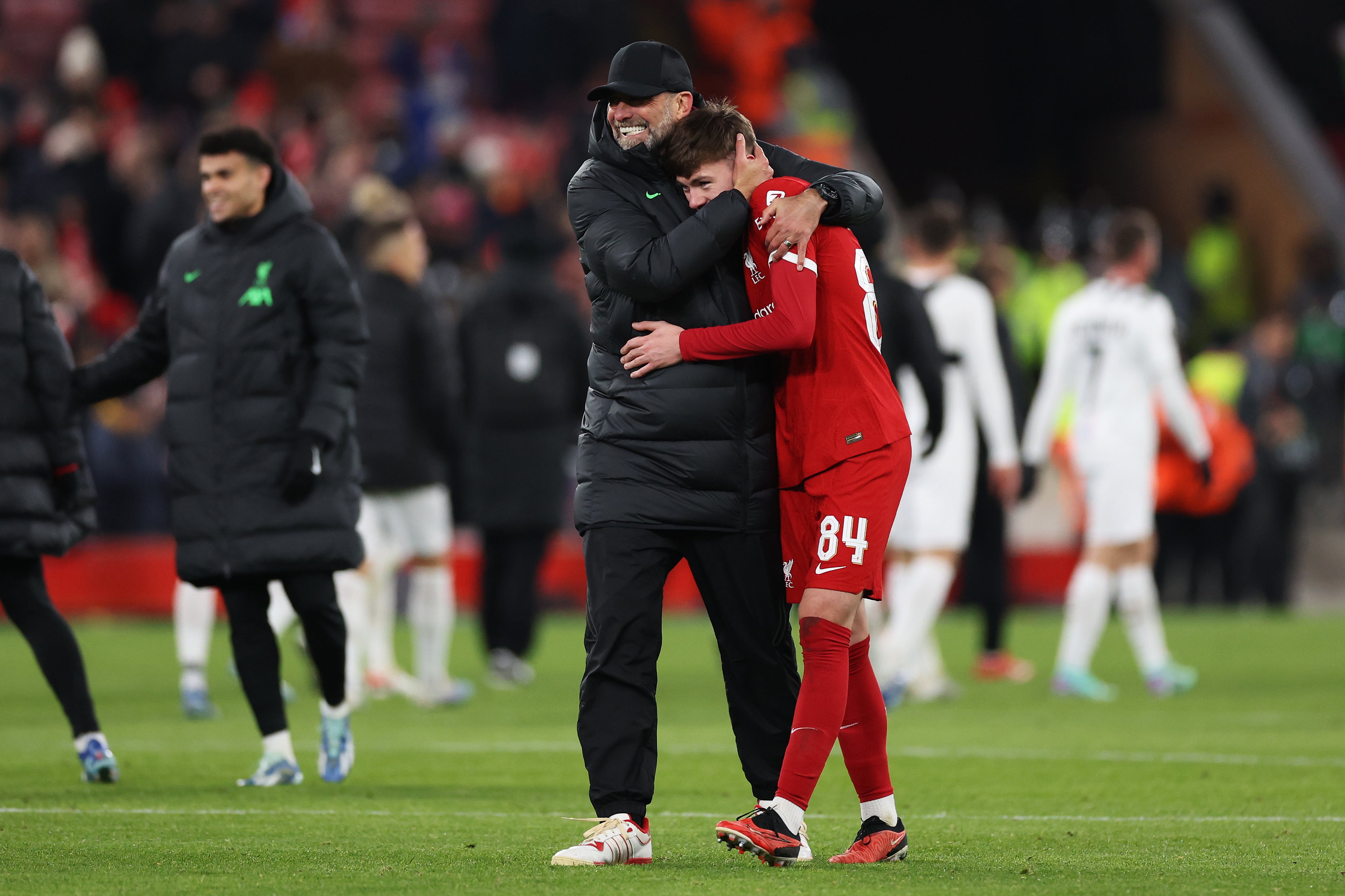 Jurgen Klopp congratulates one of the younger players in the squad