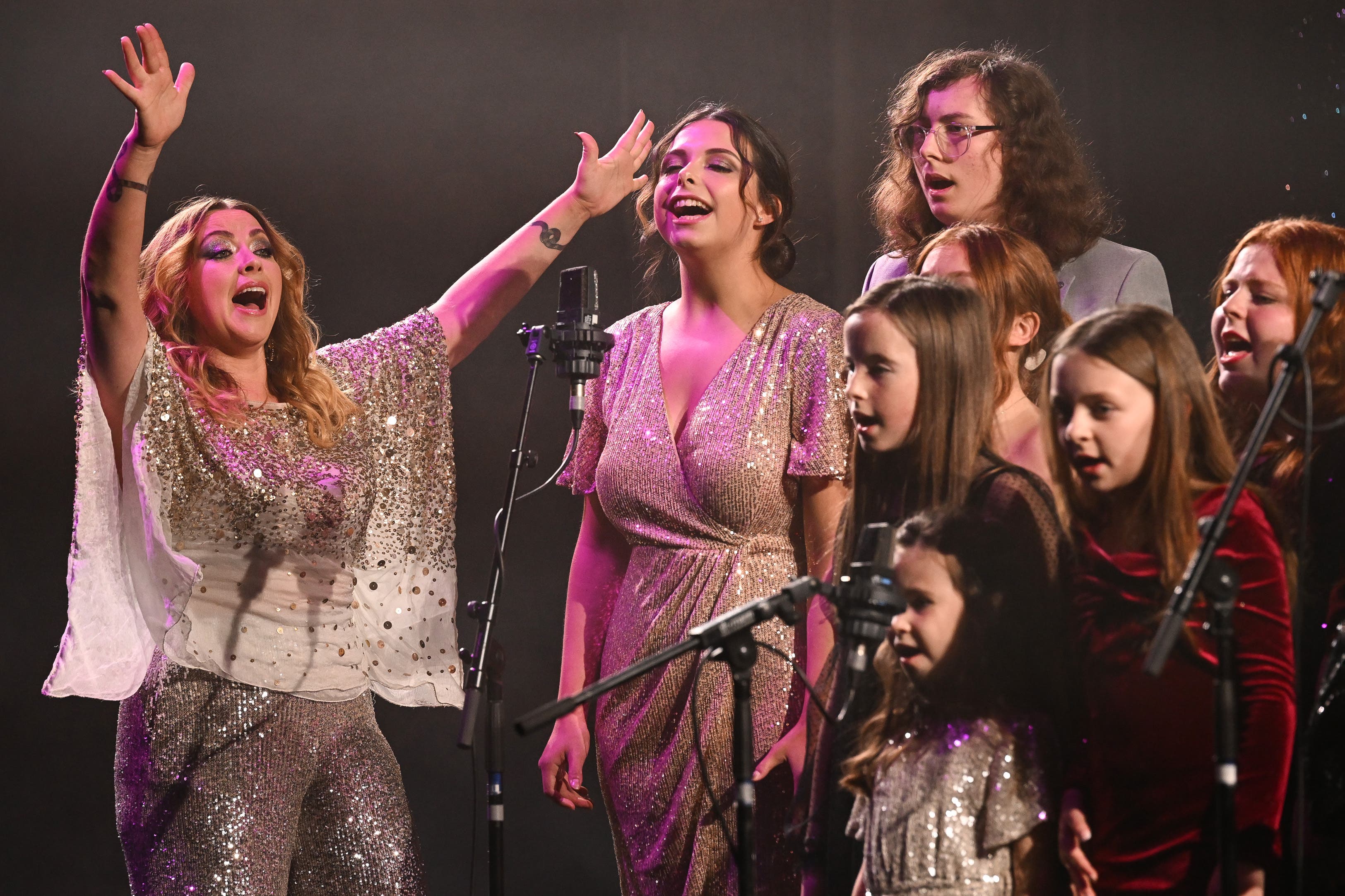 Charlotte with the choir (James Veysey/Shutterstock)