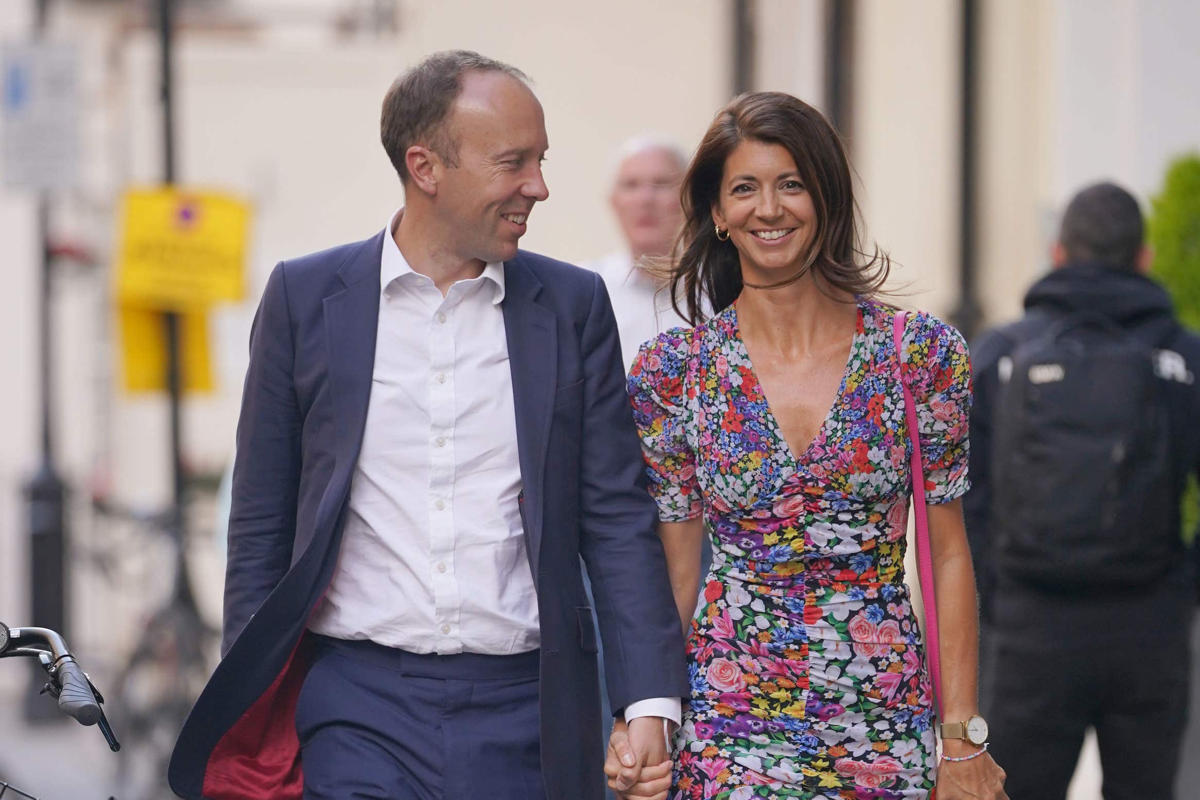 Hancock with aide, now partner Gina Coladangelo