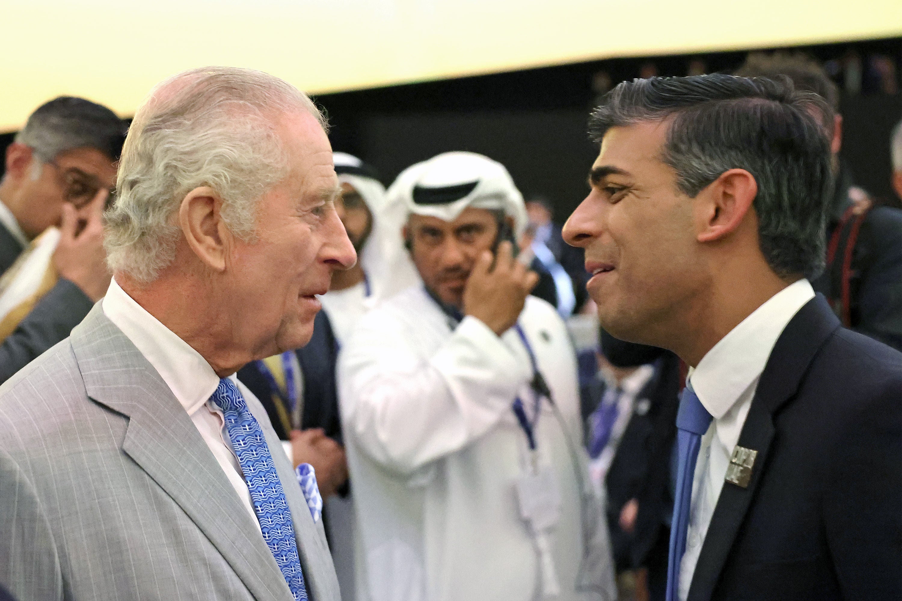 King Charles III speaks with Rishi Sunak at the opening ceremony of the World Climate Action Summit at Cop28 in Dubai