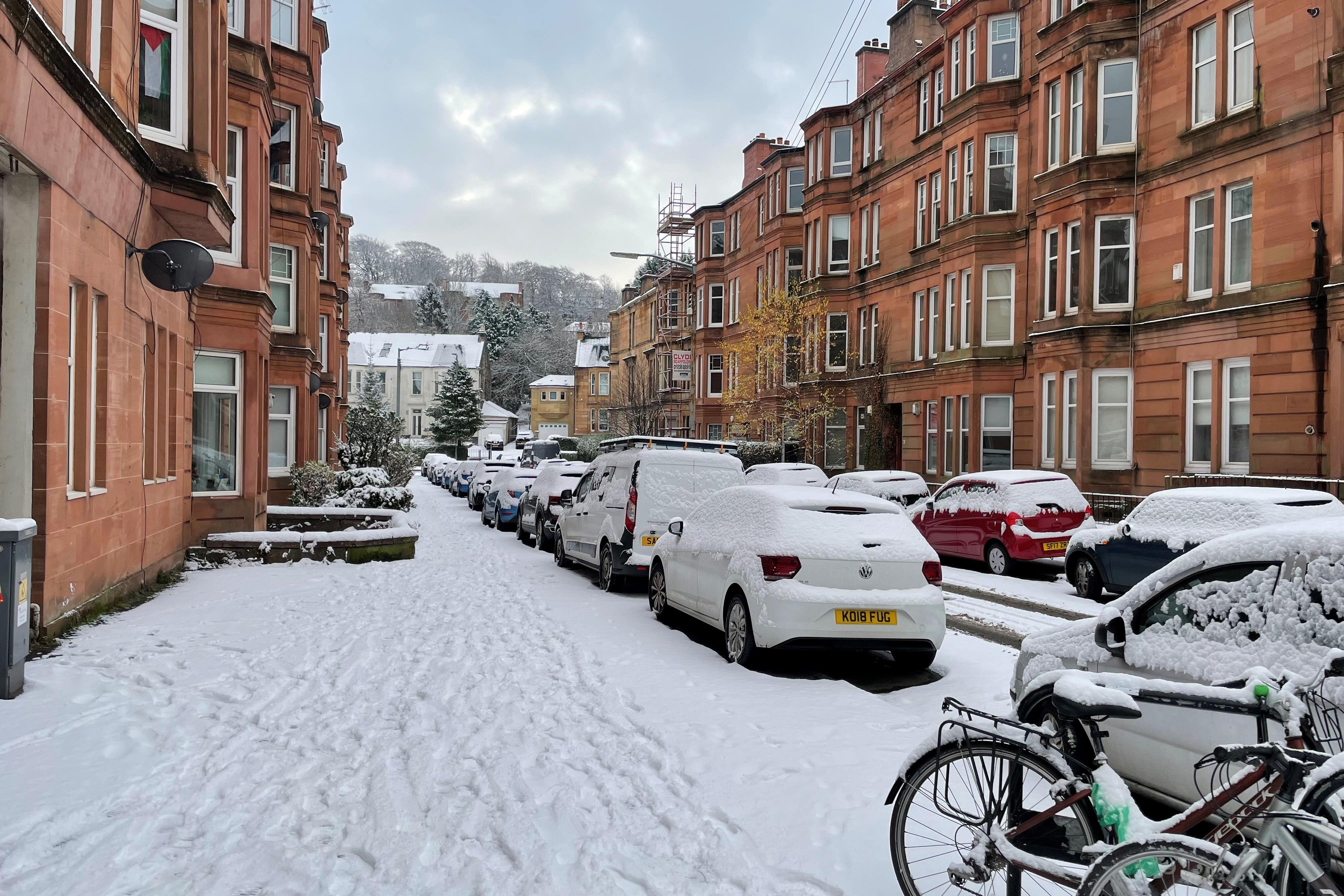 Snow in Glasgow as scattered weather warnings for snow and ice are in place across the UK (Lucinda Cameron/PA)