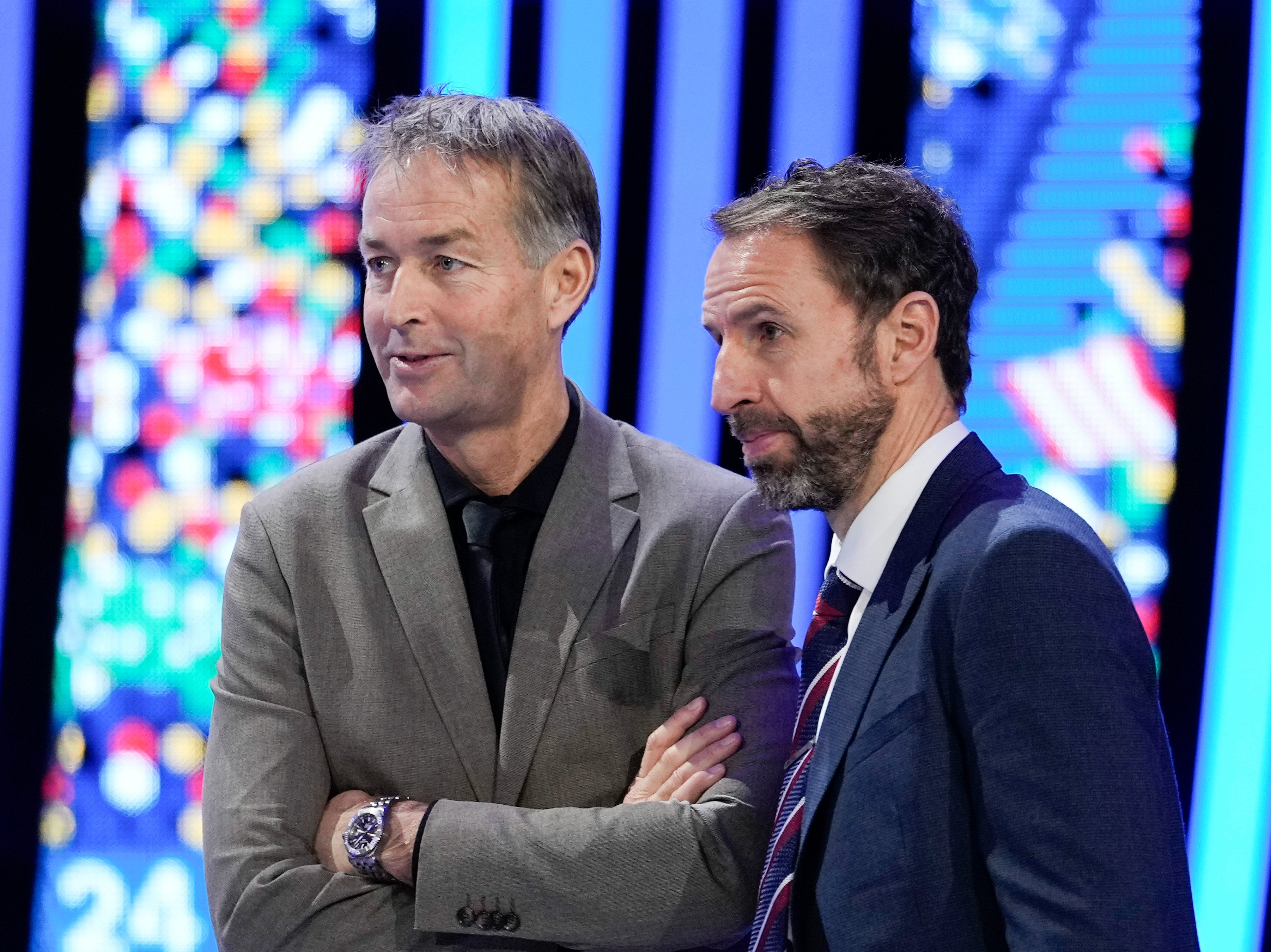 The head coaches of England, Gareth Southgate, right, and Denmark, Kasper Hjulmand