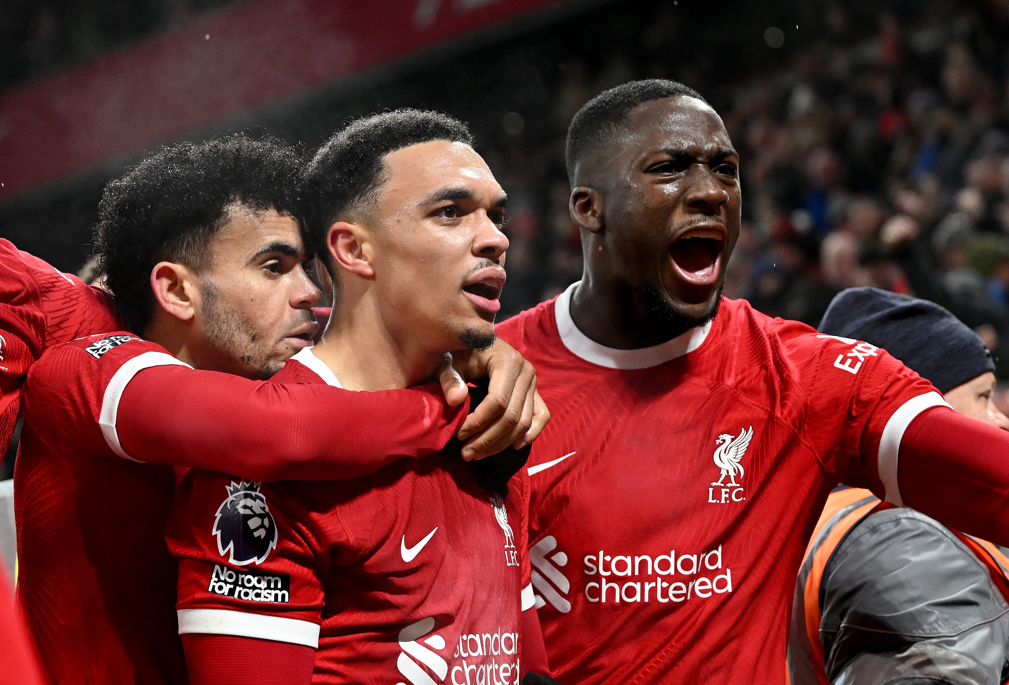 Trent Alexander-Arnold (centre) celebrates scoring Liverpool’s fourth goal in the 4-3 win over Fulham at Anfield