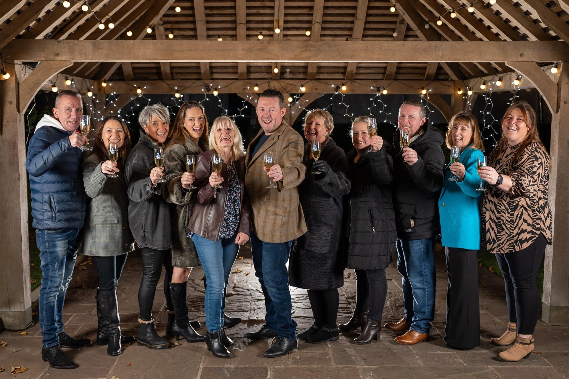 Members of the EuroMillions syndicate at the Ye Olde Bell near Retford are celebrating sharing a £1m win (Camelot UK/PA)