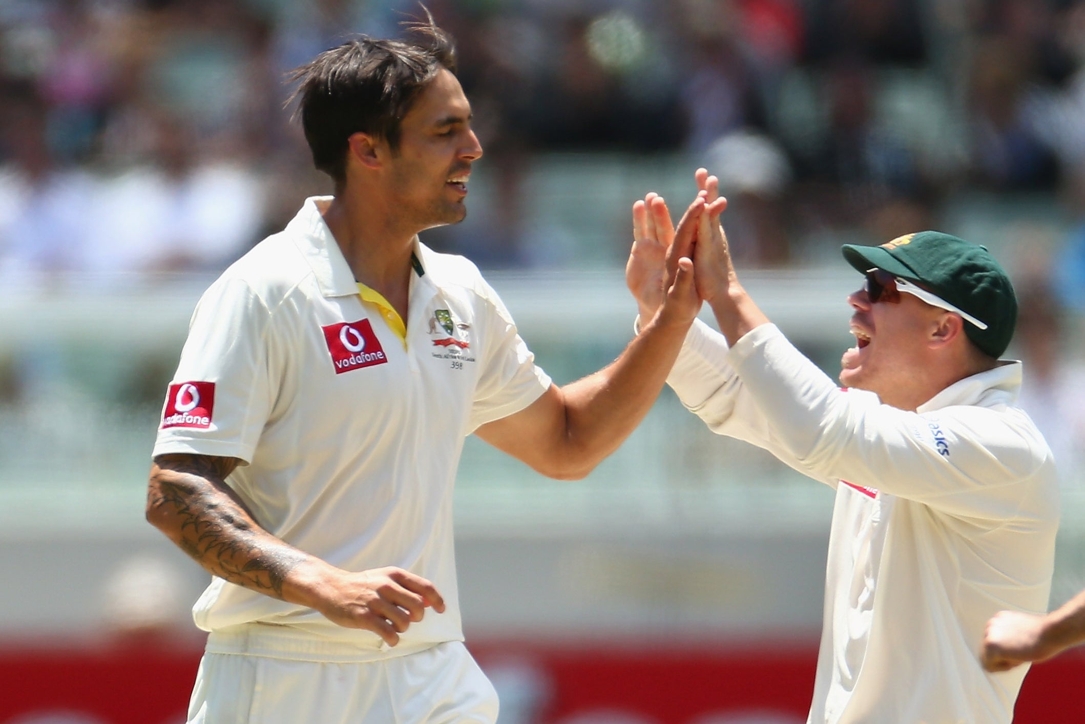 Mitchell Johnson (left) has hit out at former teammates David Warner