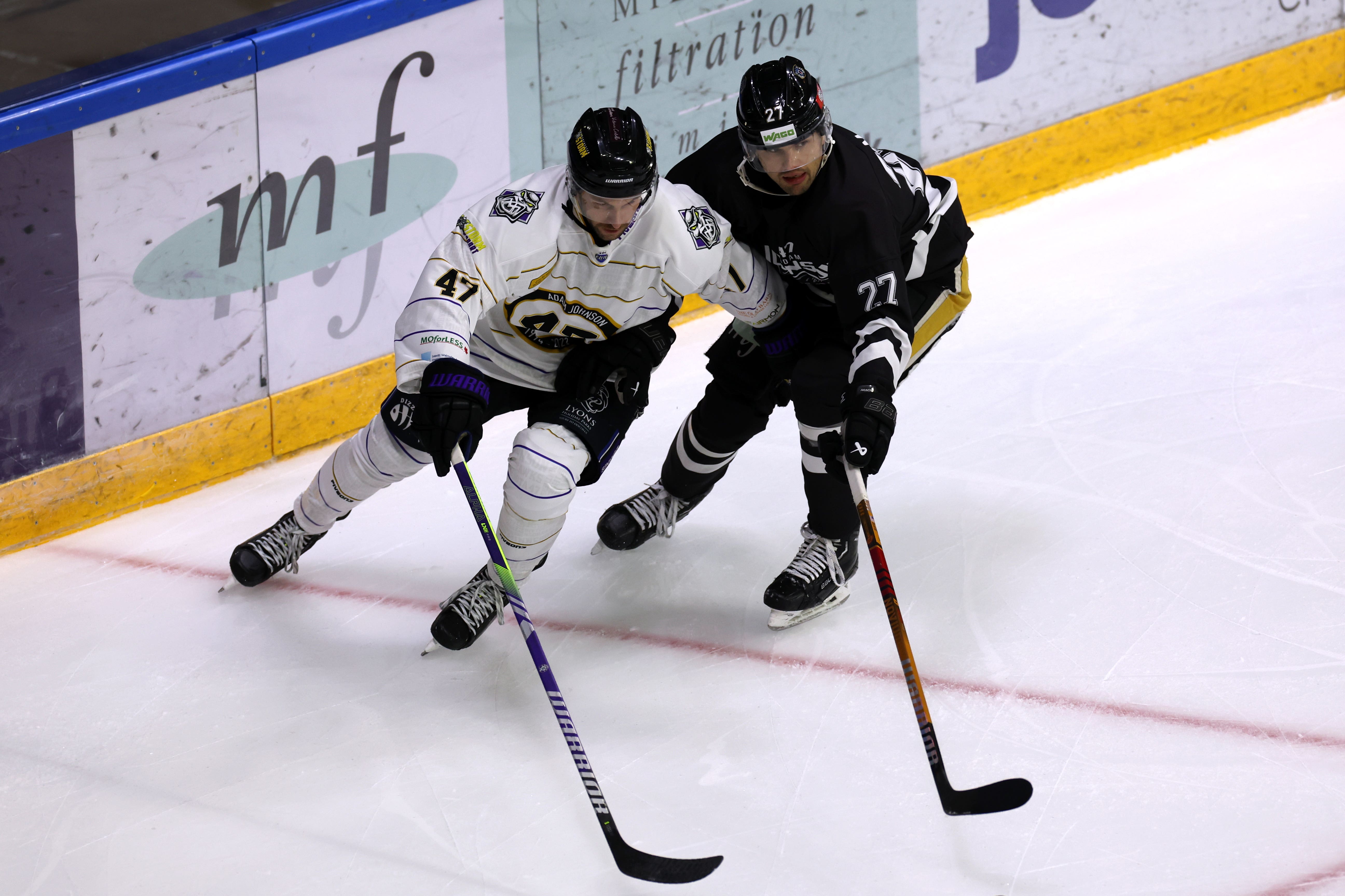 Manchester Storm’s C.J. Garcia (left) and Nottingham Panthers’ Myles McGurty battle for the puck during the Adam Johnson Memorial Game at the Motorpoint Arena, Nottingham. Picture date: Saturday November 18, 2023.