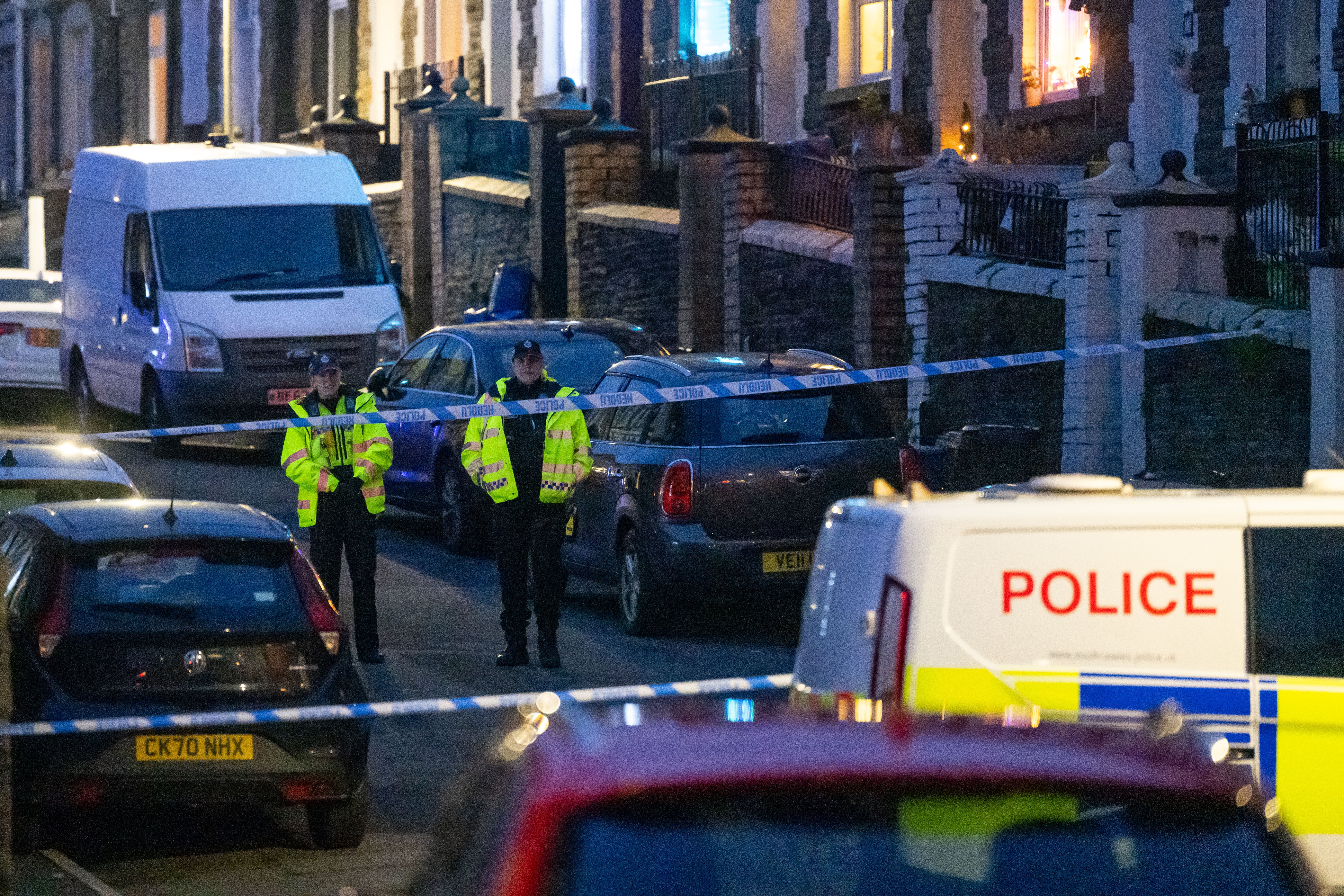 A cordon remained up after the arrest of a man after a woman was stabbed