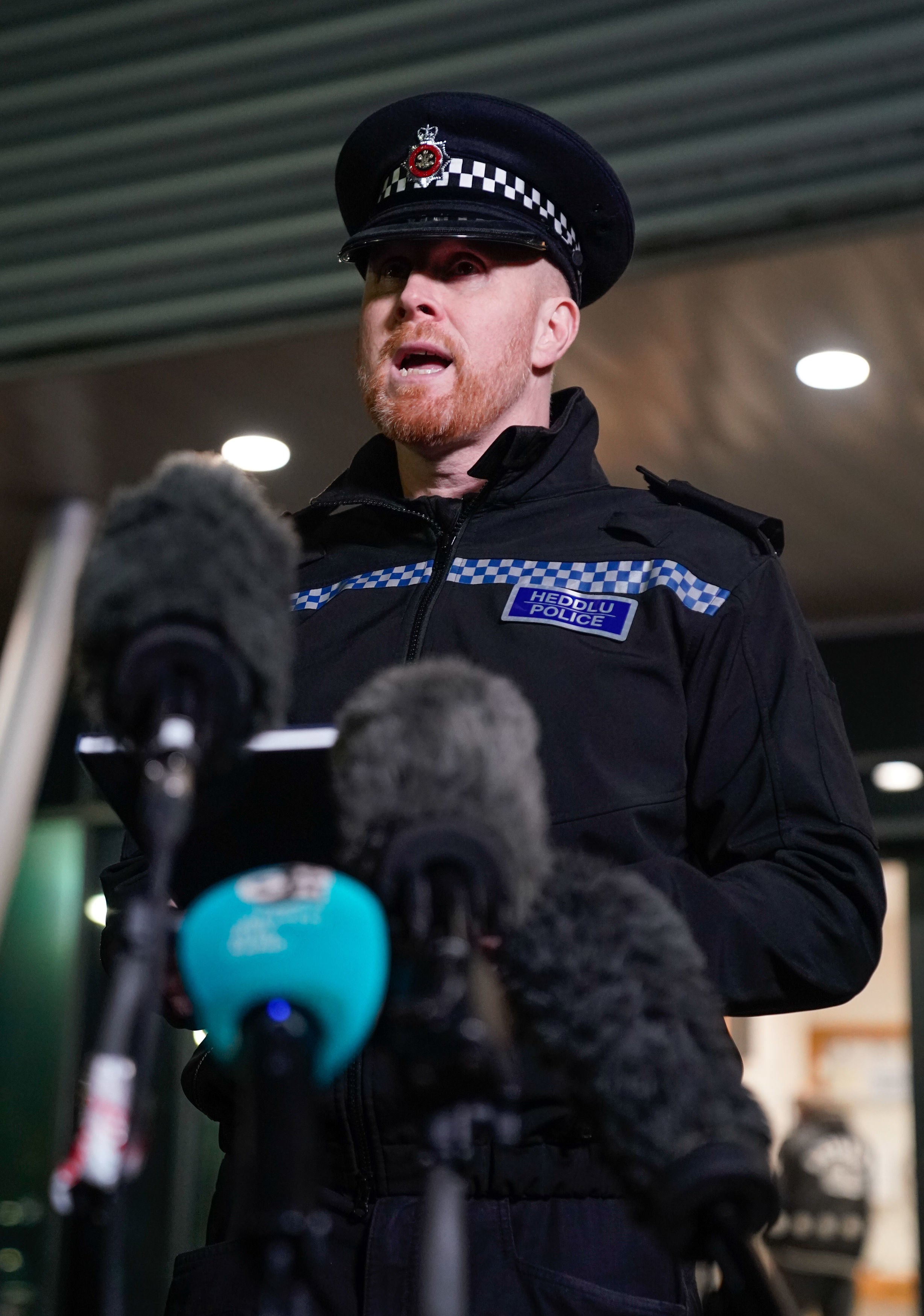 Chief Inspector Rob Miles of South Wales Police makes a statement to the media outside Merthyr Tydfil police station