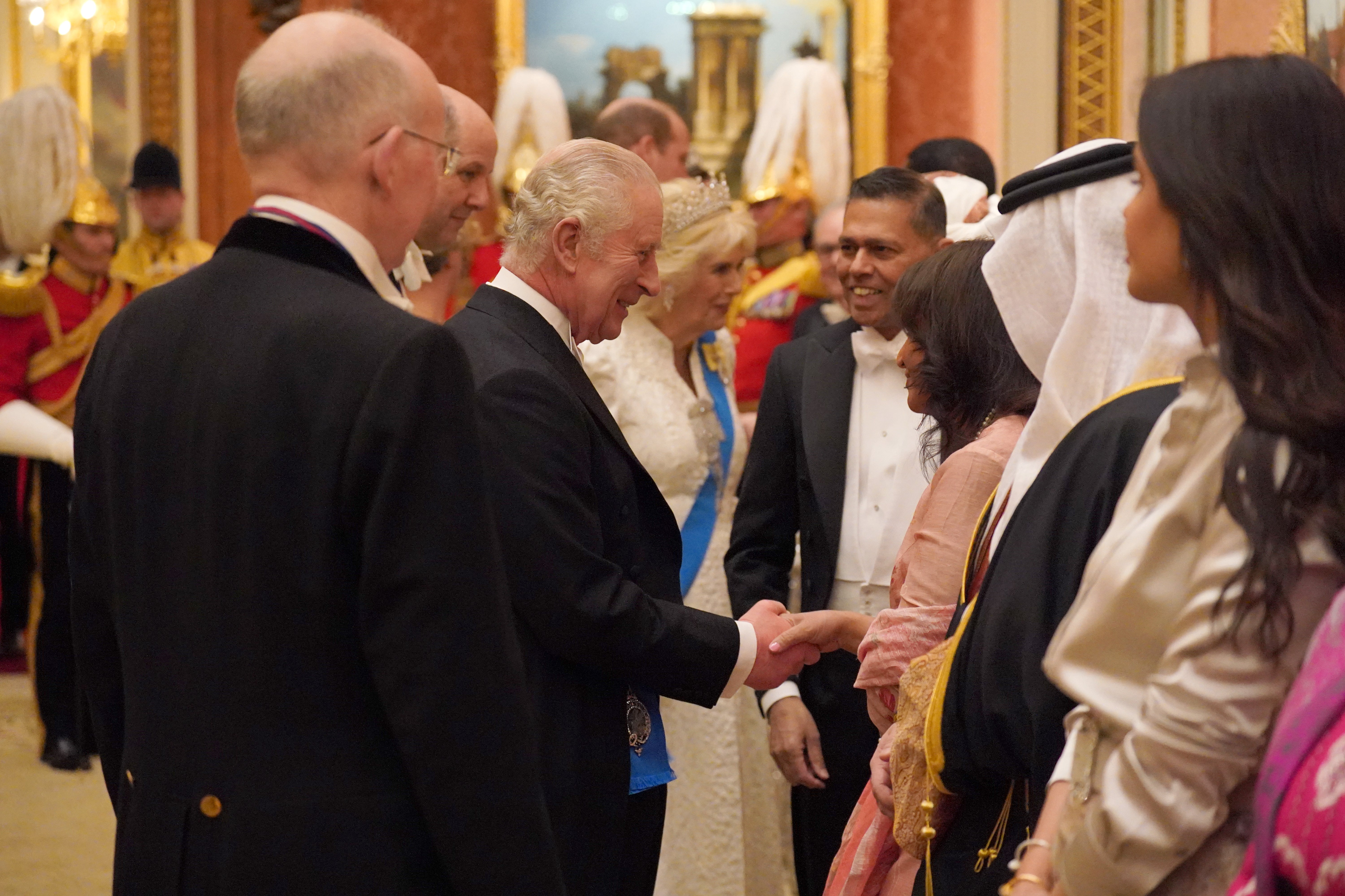 Camilla wore the Girls of Great Britain and Ireland Tiara with a diamond brooch which belonged to the late Queen Mother