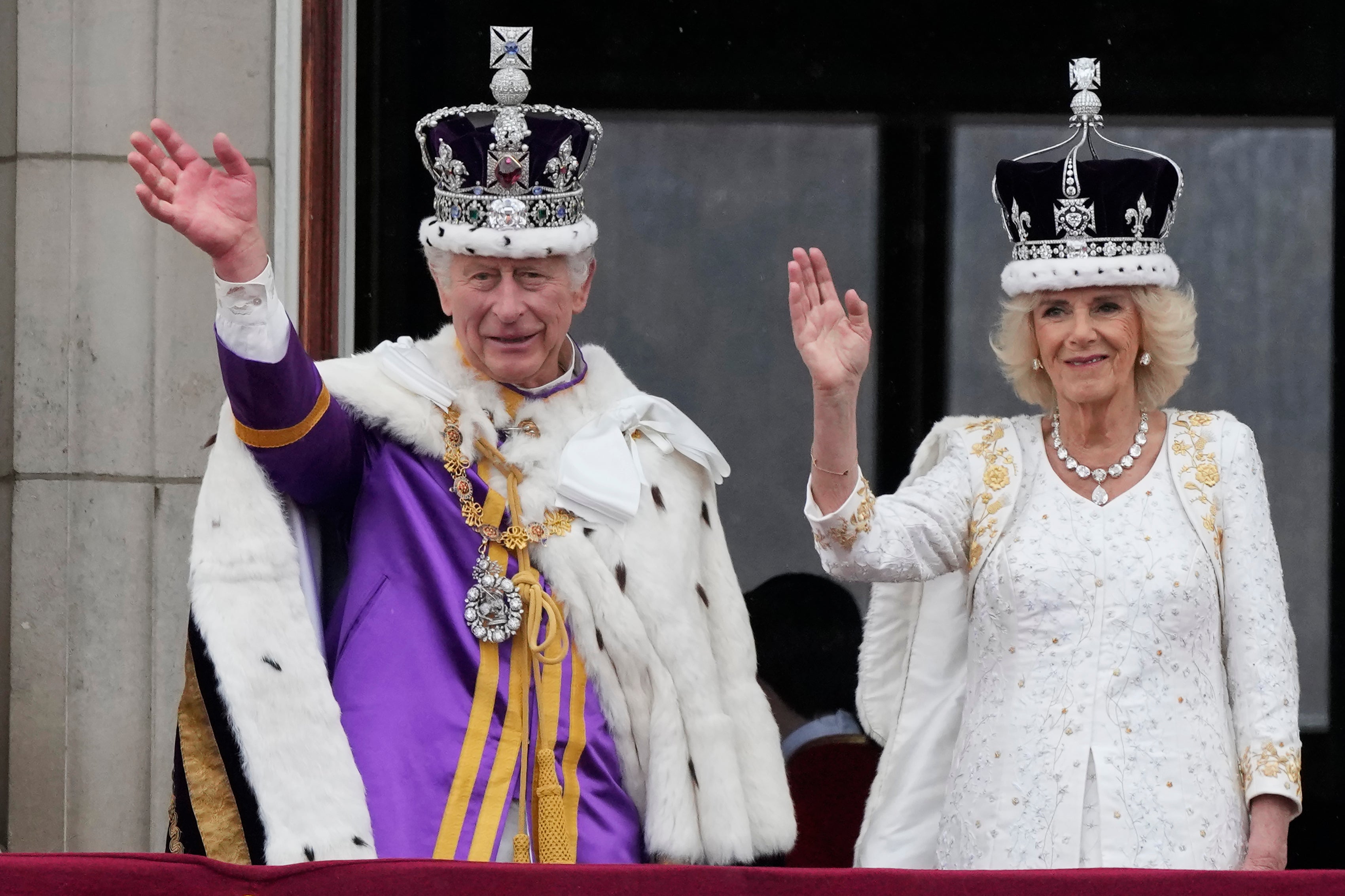 King Charles and Queen Camilla on the balcony of Buckingham Palace following their coronation this year