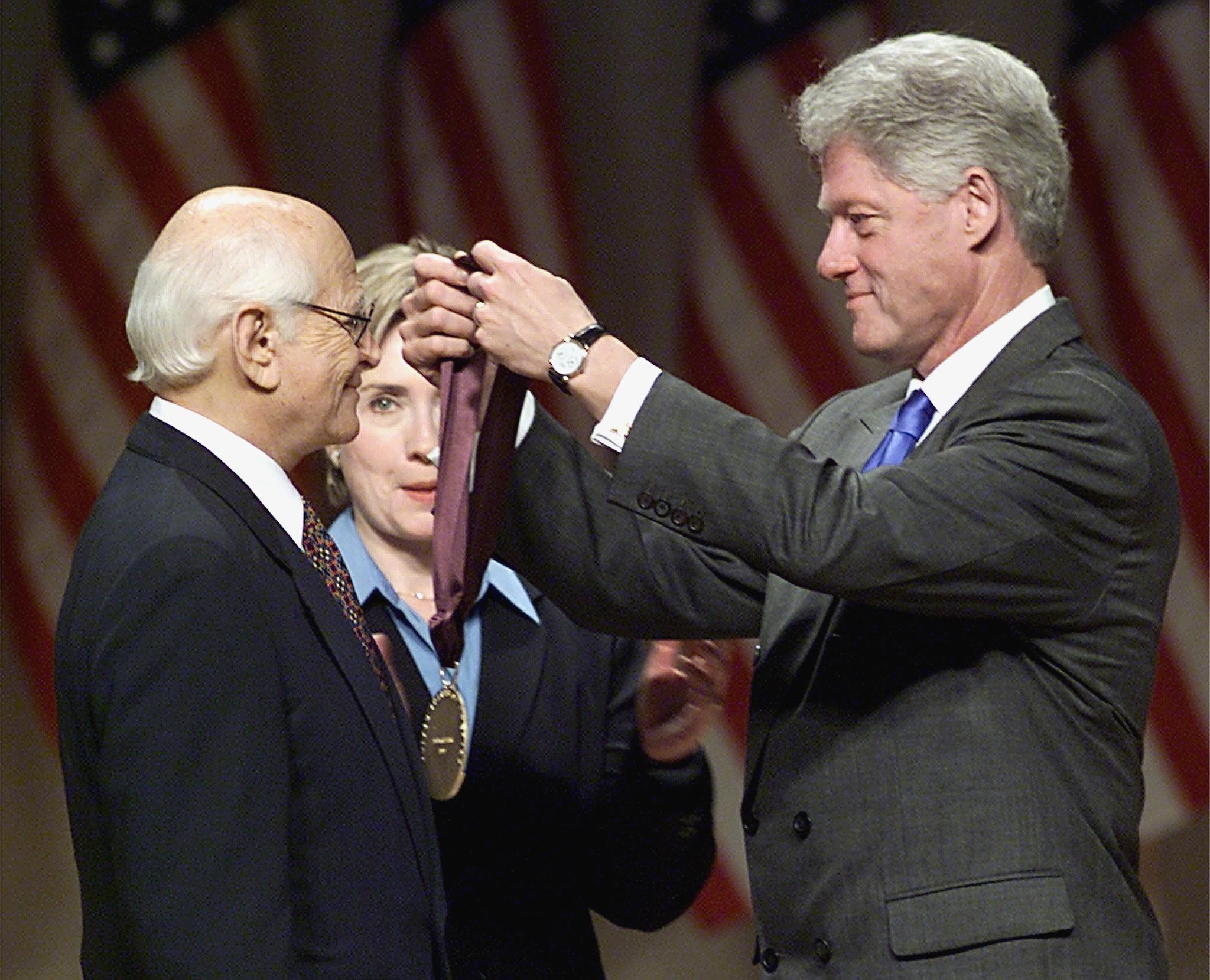 Receiving the National Medal of Arts and Humanities Award from president Bill Clinton in 1999