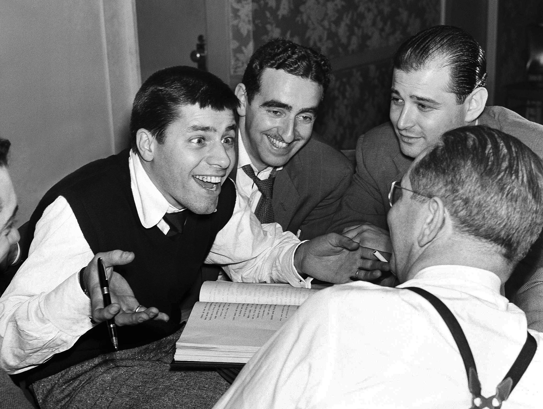 Jerry Lewis (left), Ed Simmons (centre), Norman Lear (background right) and Ernie Glucksman at work on ‘The Dean Martin and Jerry Lewis Show’ in New York in 1951.