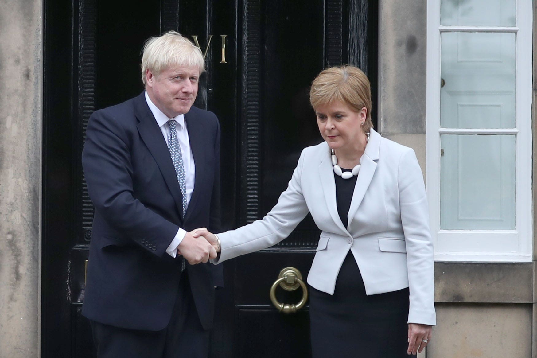 Boris Johnson and Nicola Sturgeon (Jane Barlow/PA)