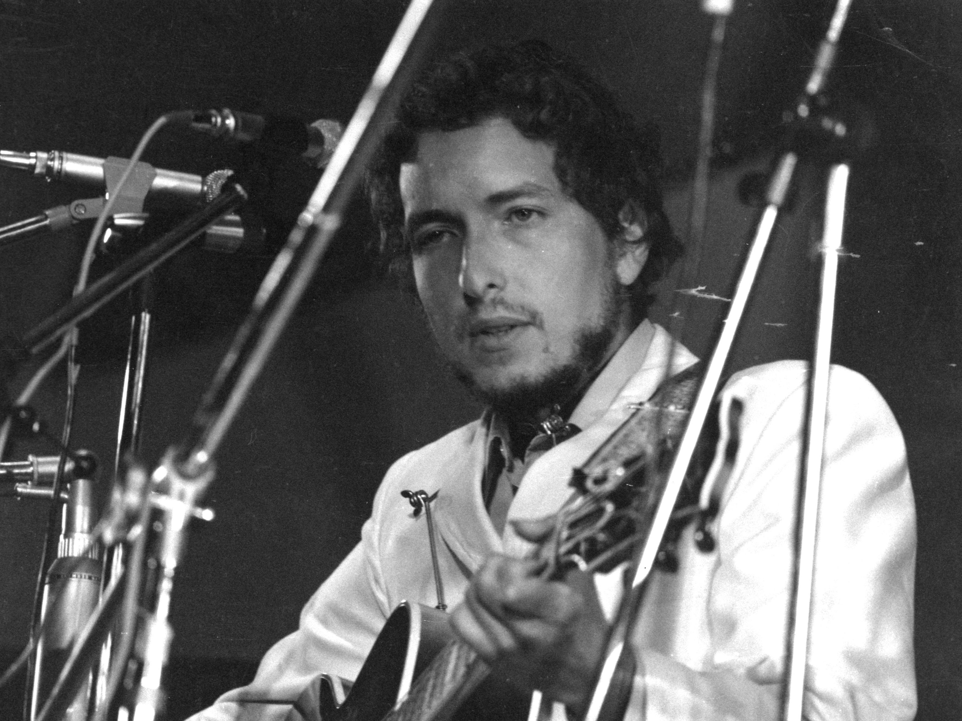 Bob Dylan performs at the Isle of Wight Pop Festival in 1969, fresh off working with The Band at The Big Pink