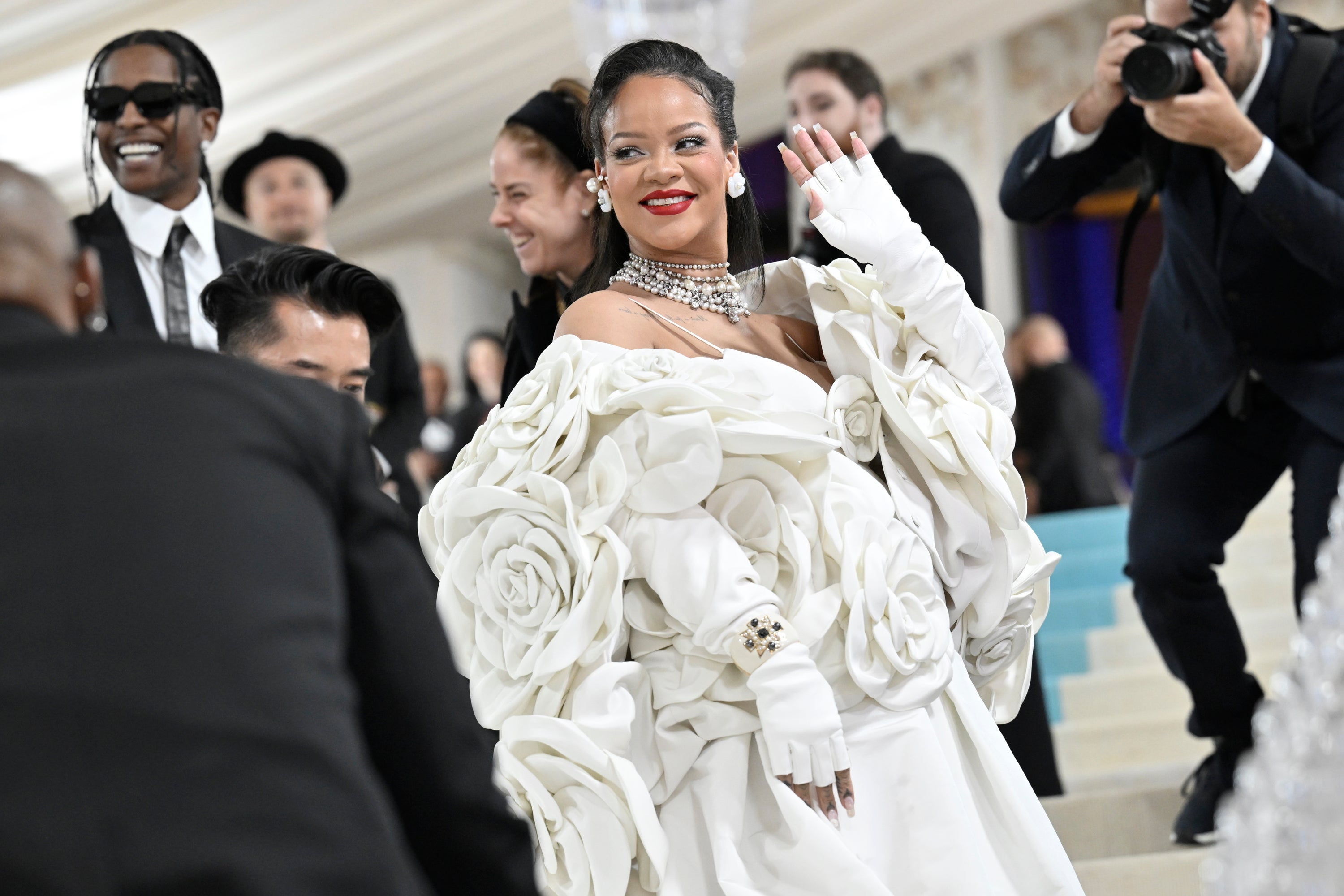 Rihanna may show up to the 2025 Met Gala alongside her partner, A$AP Rocky, and debut her third pregnancy