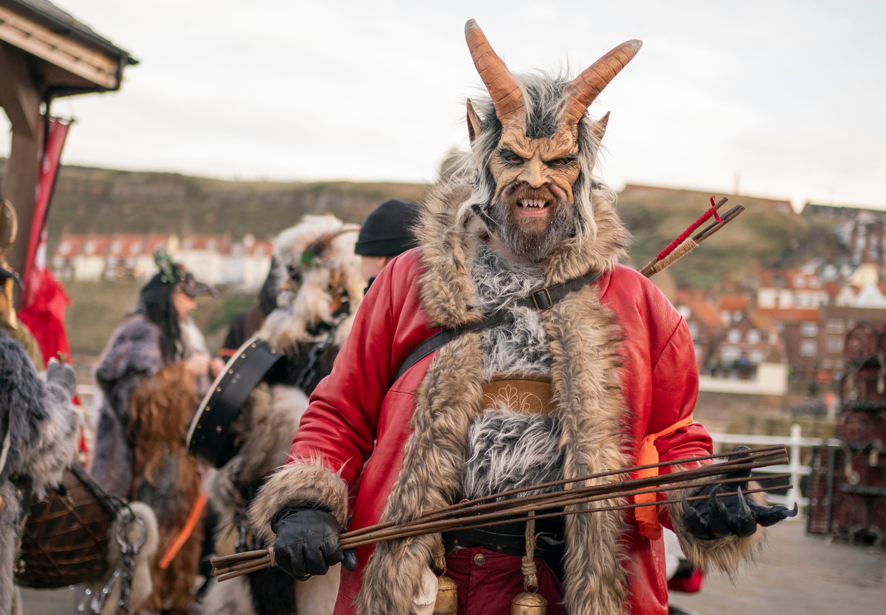 <p>Participants ahead of the Whitby Krampus Run in Whitby, Yorkshire, which celebrates the Krampus, a horned creature which accompanies Saint Nicholas on his rounds. </p>