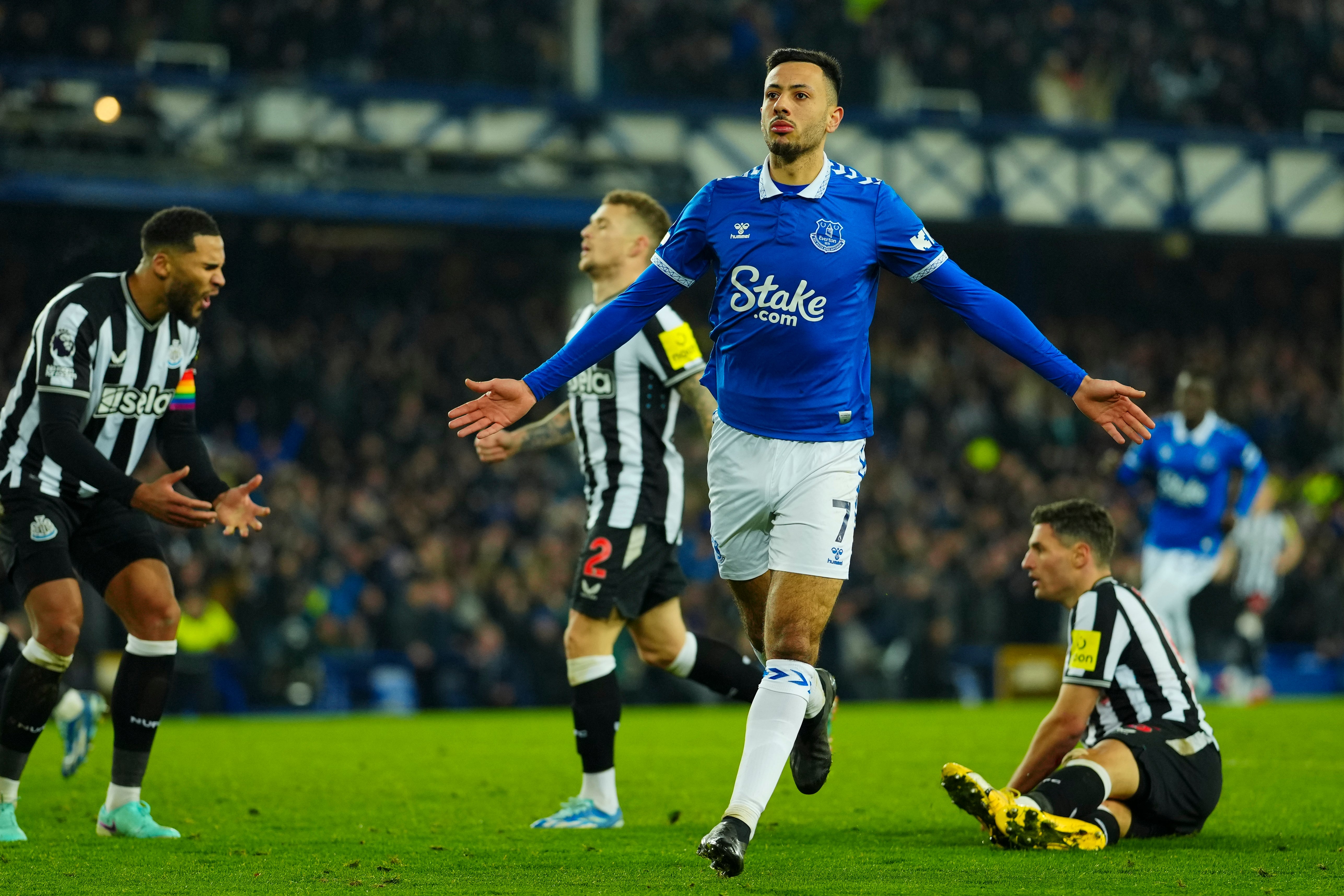 Dwight McNeil celebrates after scoring the opening goal for Everton on Thursday evening