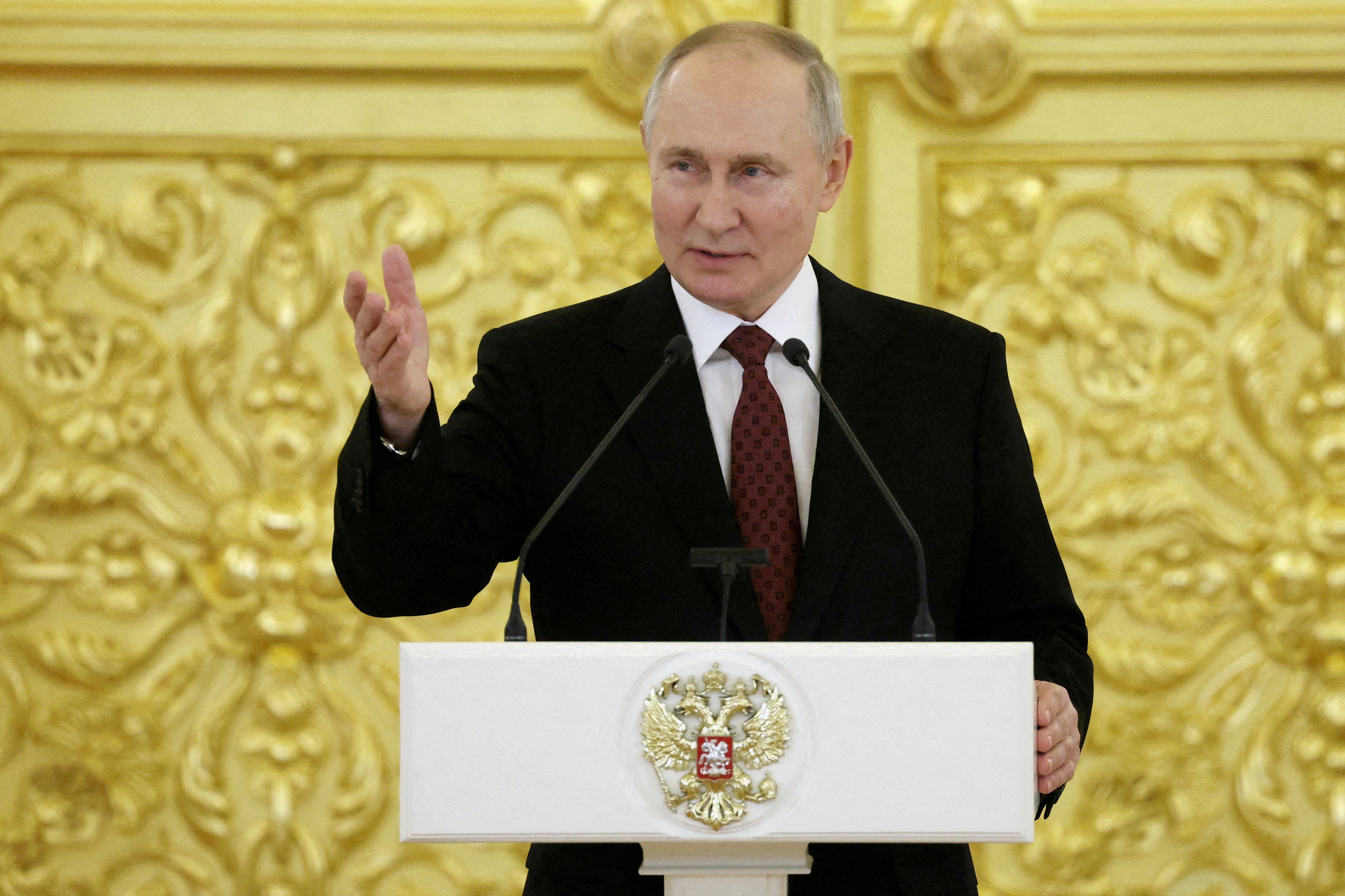 Vladimir Putin speaks at a ceremony to receive diplomatic credentials from newly appointed foreign ambassadors at the Grand Kremlin Palace in Moscow