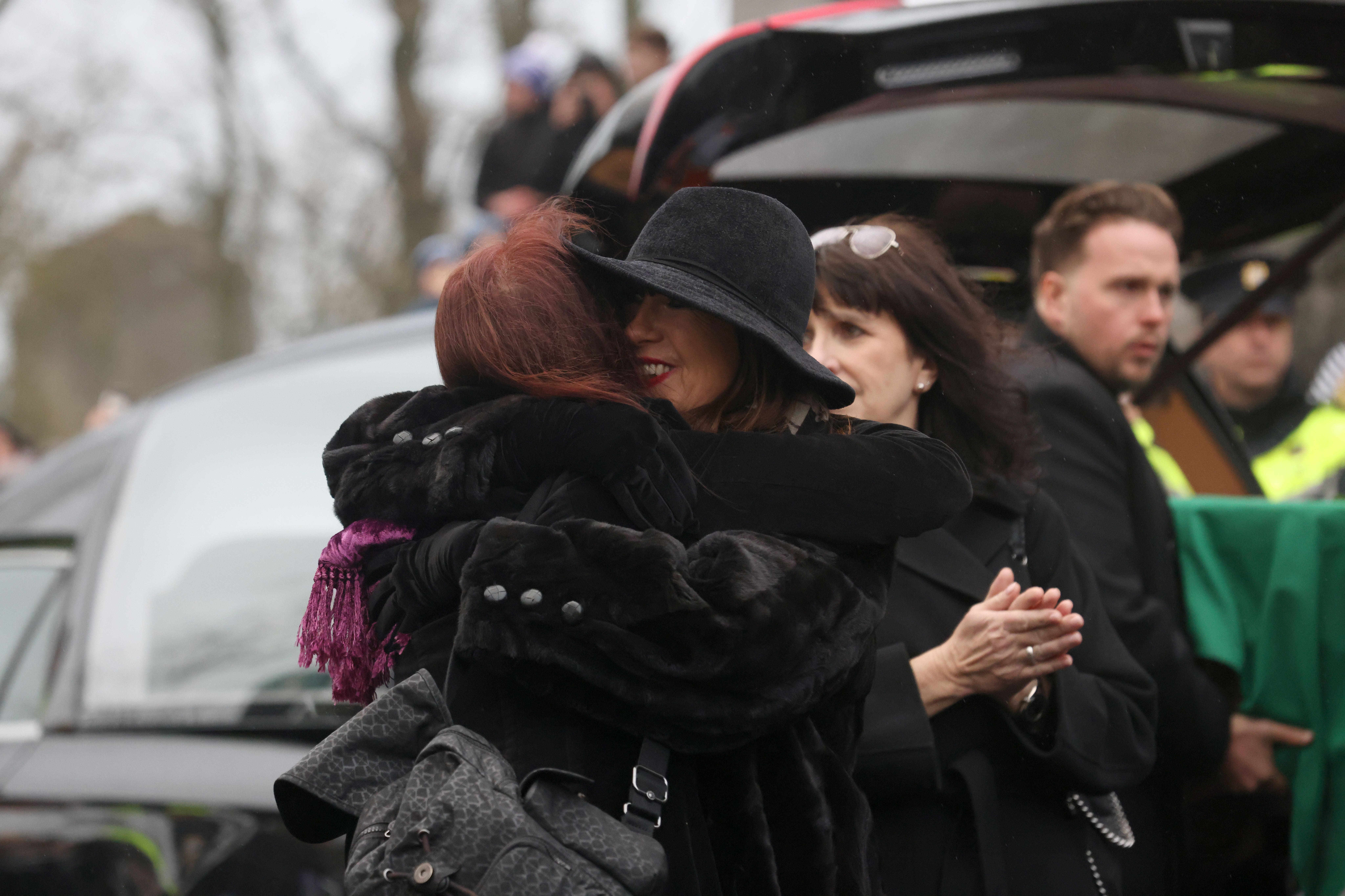 Victoria Mary Clarke (right), wife of Shane MacGowan, arrives for the funeral at Saint Mary’s of the Rosary Church, Nenagh, Co. Tipperary (Niall Carson/PA)