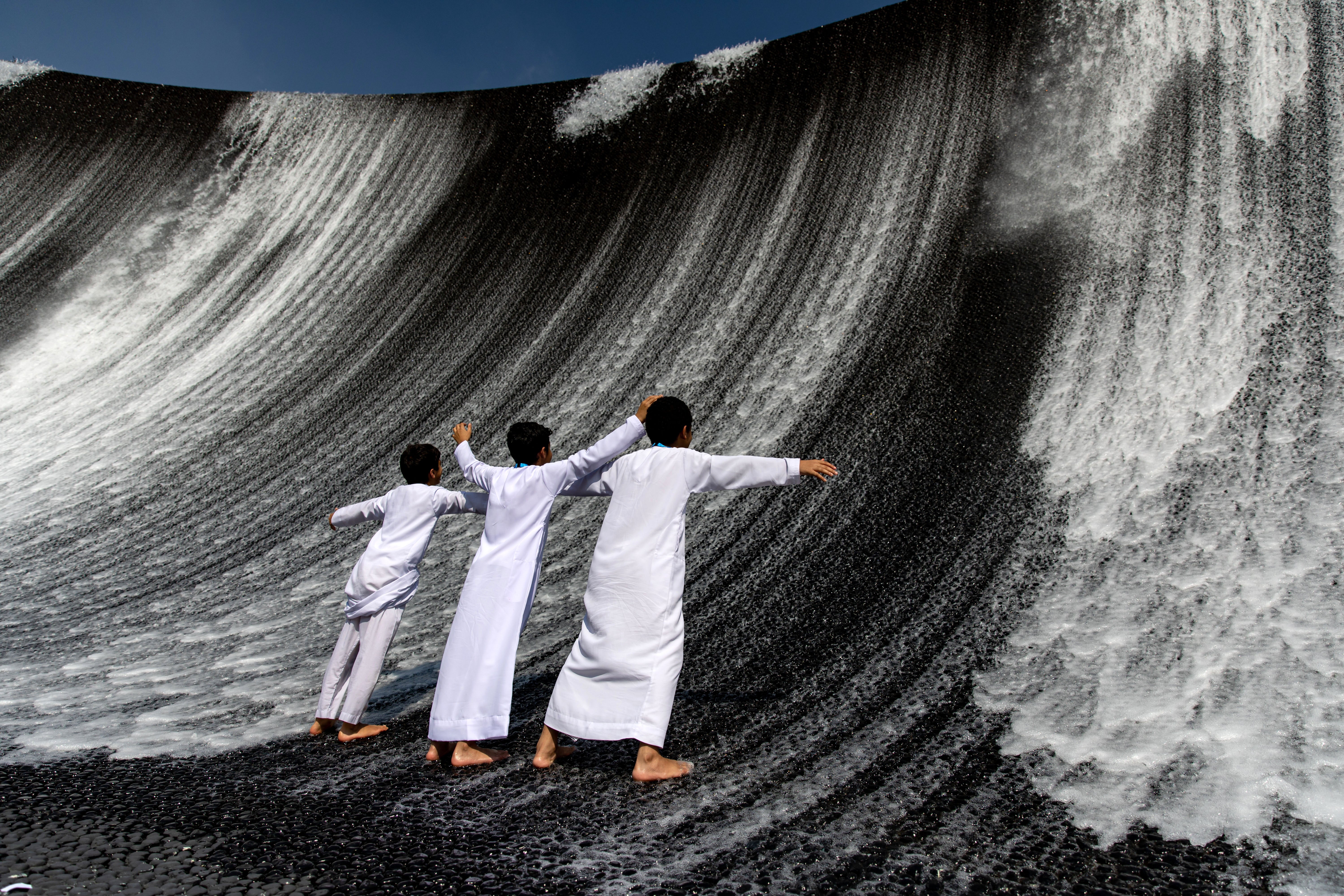 Surf’s up: a surreal indoor water feature at the Cop28 climate change conference at Dubai’s Expo City