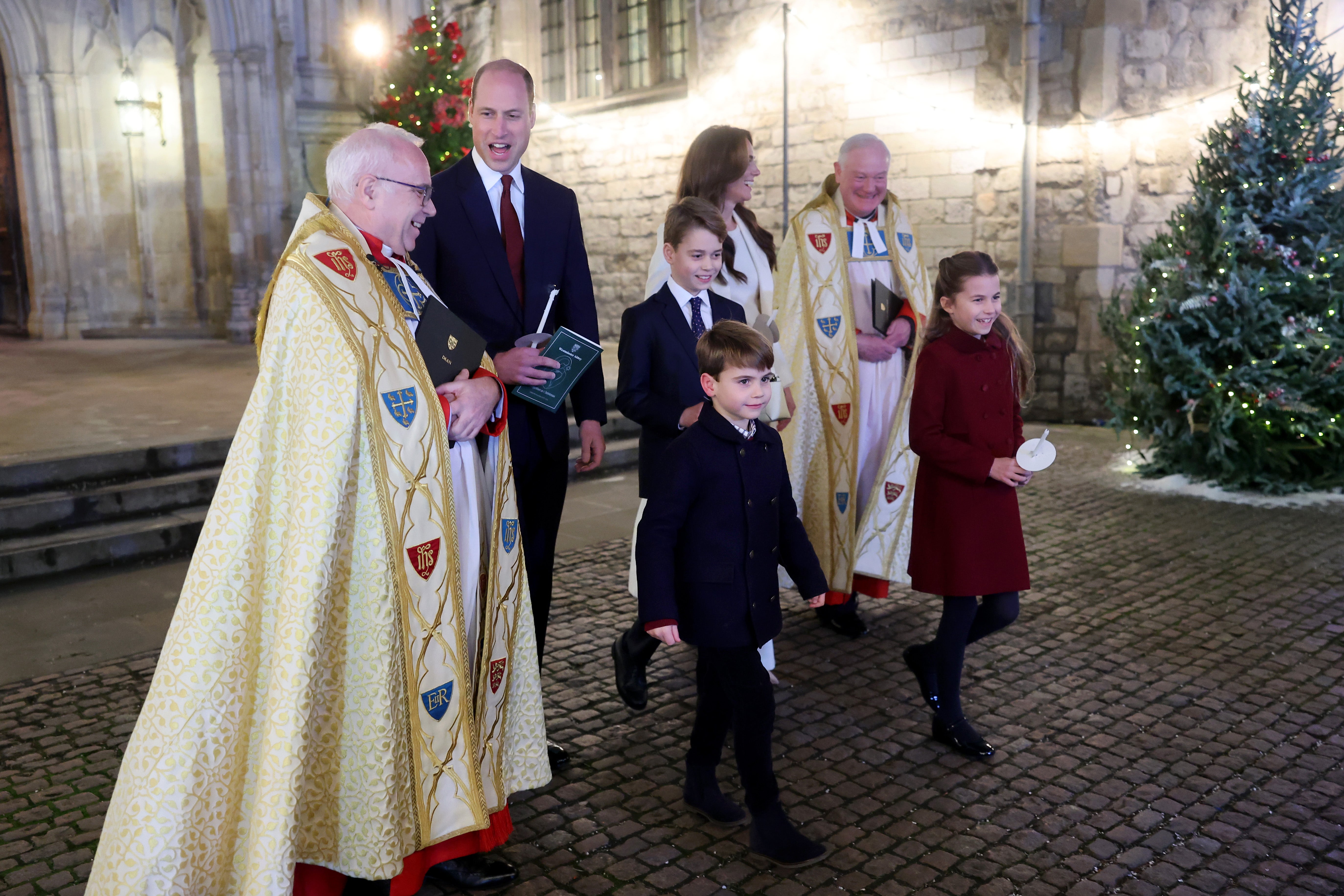 The Dean of Westminster Abbey, The Very Reverend Dr David Hoyle, the Prince of Wales, Prince George, Prince Louis, the Princess of Wales and Princess Charlotte leave after the service